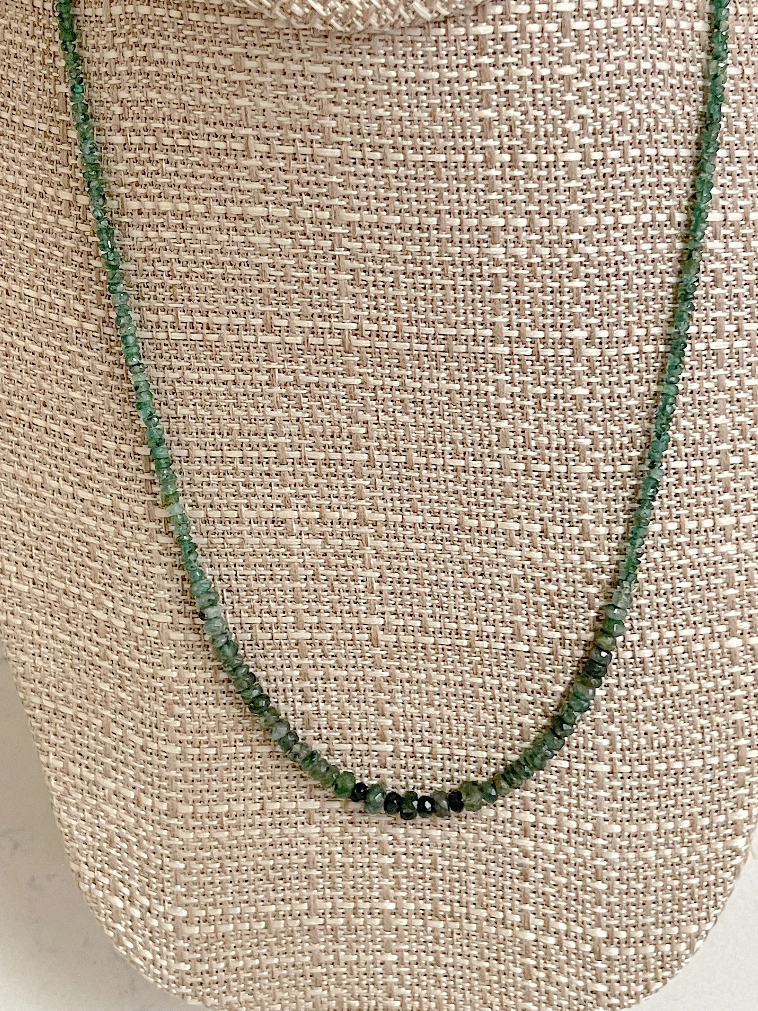 Emeralds on stand closeup.jpg