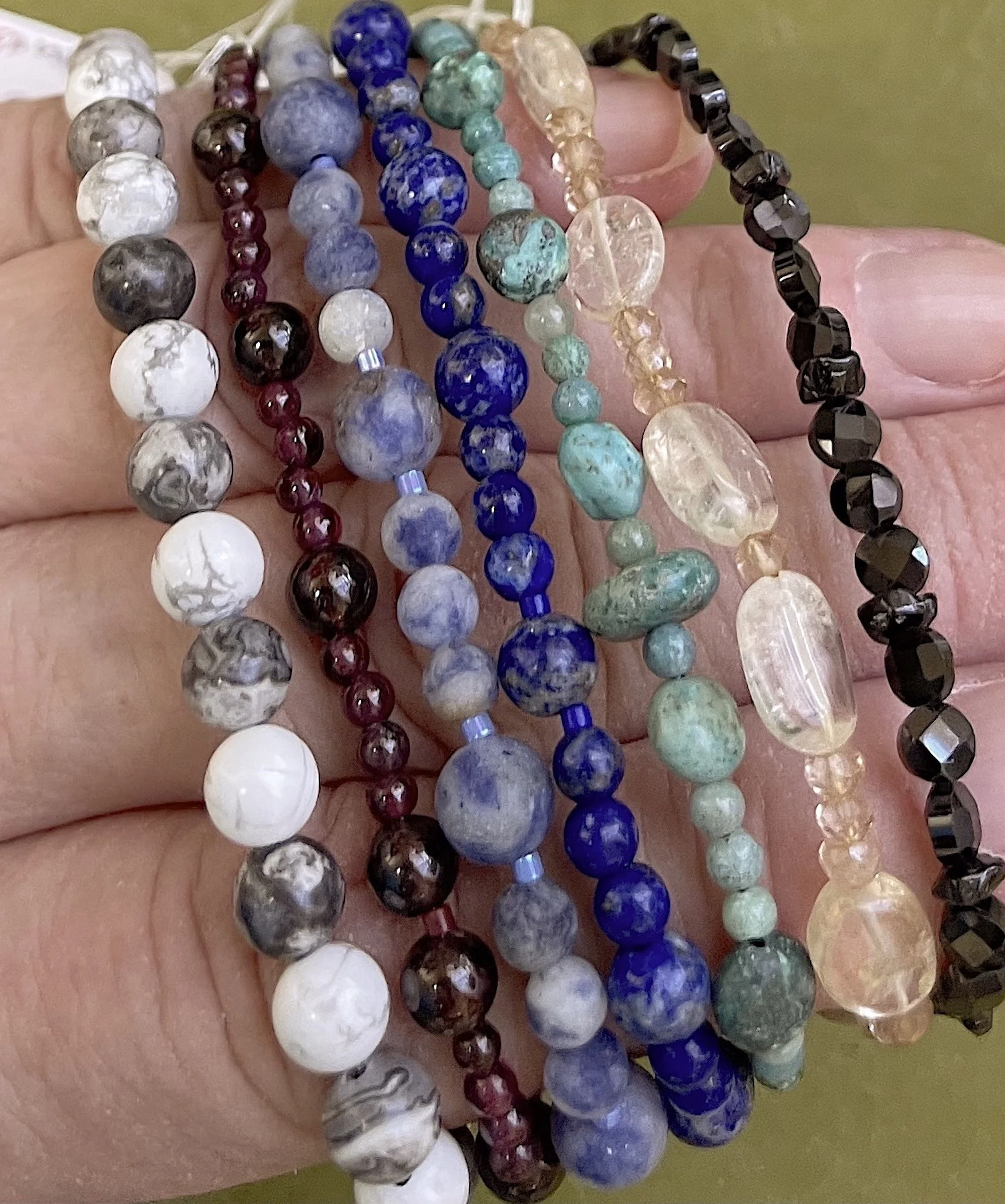 Bracelets with heart clasps and Black spinel.jpg