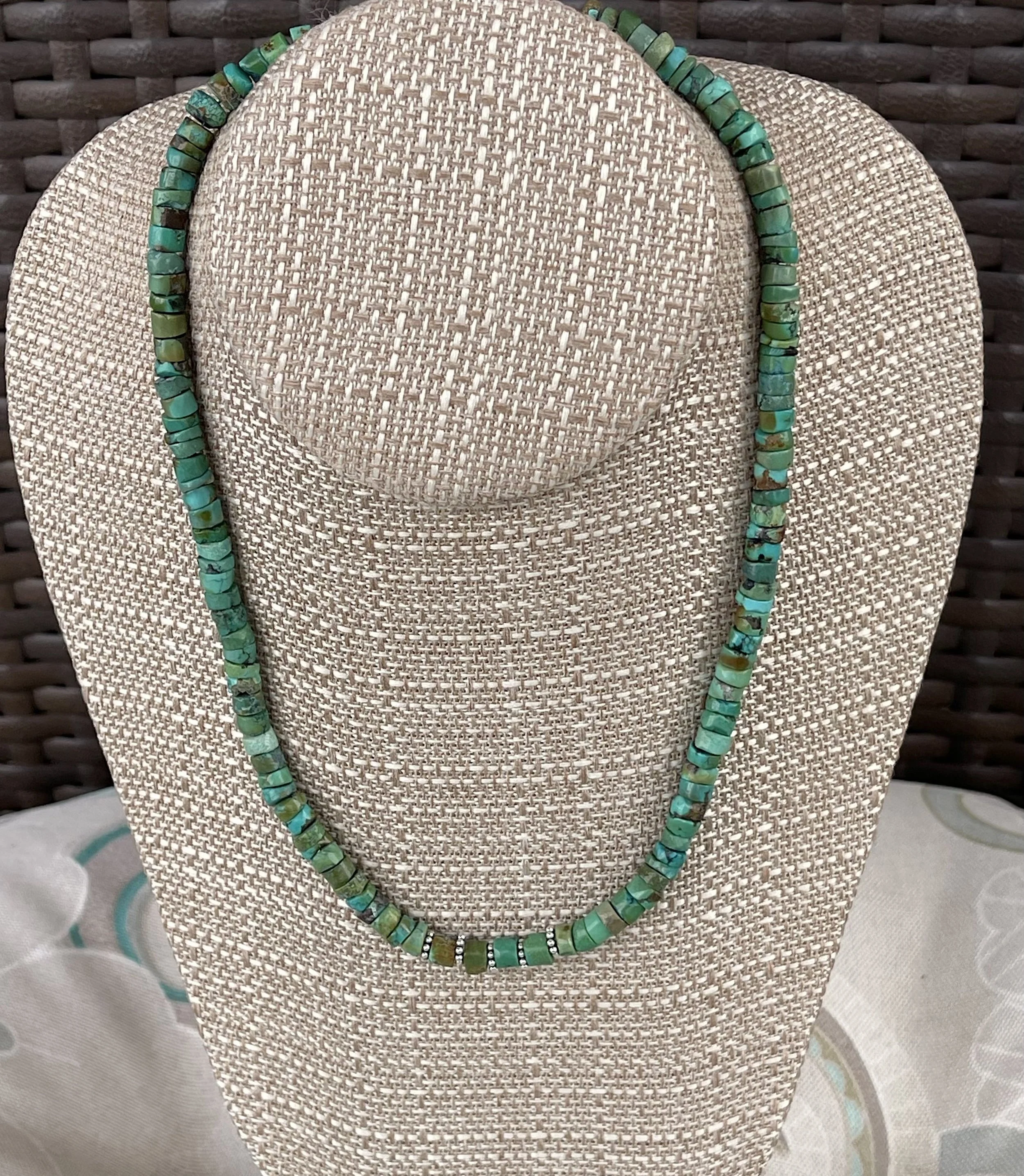 Turquoise Heishi-outisde chair.jpg