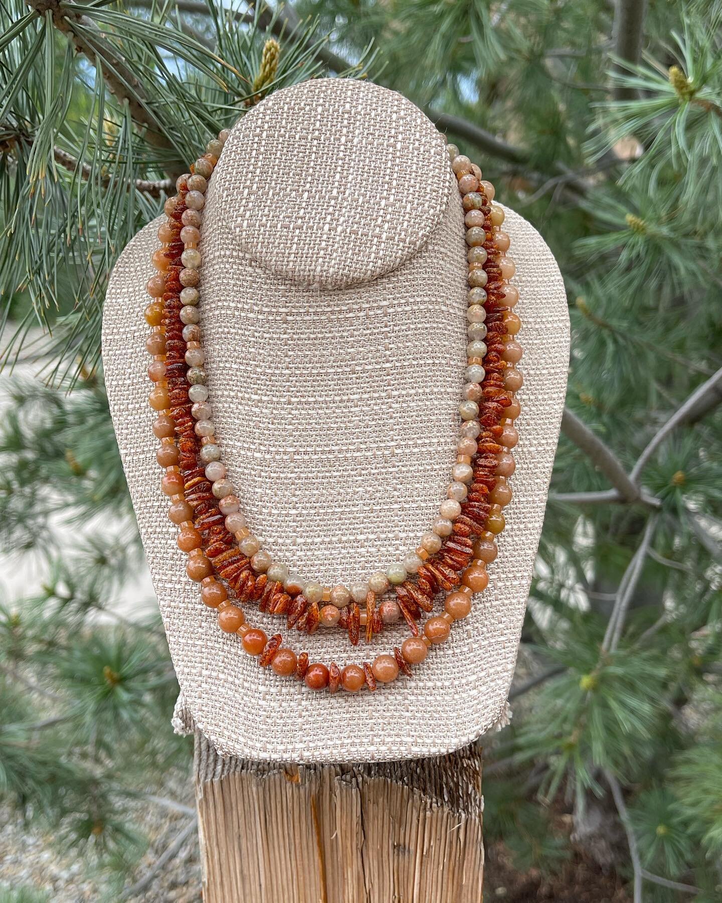 Autumn Jasper is a triple strand necklace featuring Autumn Jasper smaller rounds, Amber chips and Red Aventurine 8mm rounds and heishi beads. I used a gold plated brass fancy slide and lock clasp. The short strand is 17 1/2 inches and the longest is 