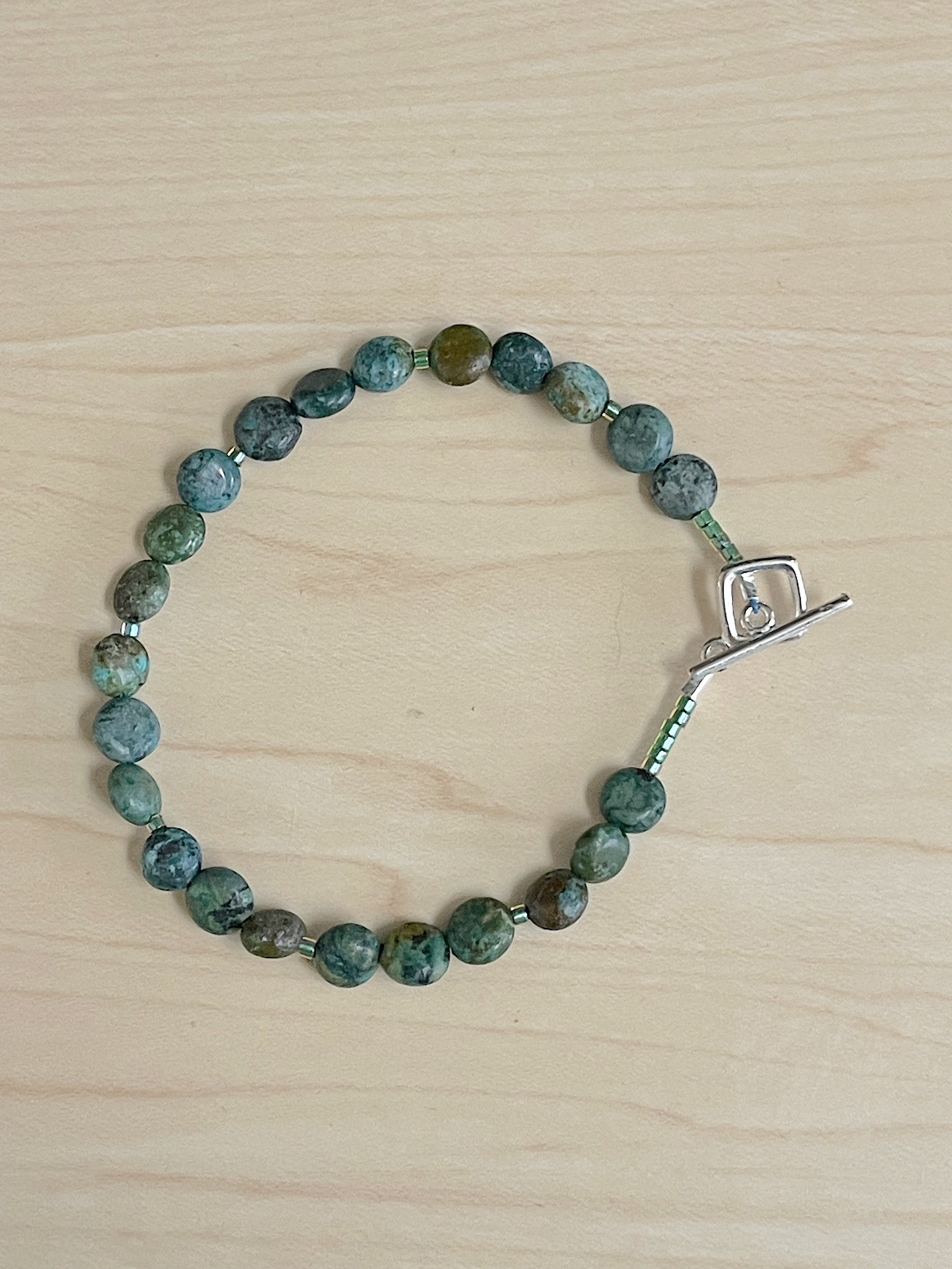 Green Turquoise flat round bracelet.jpg