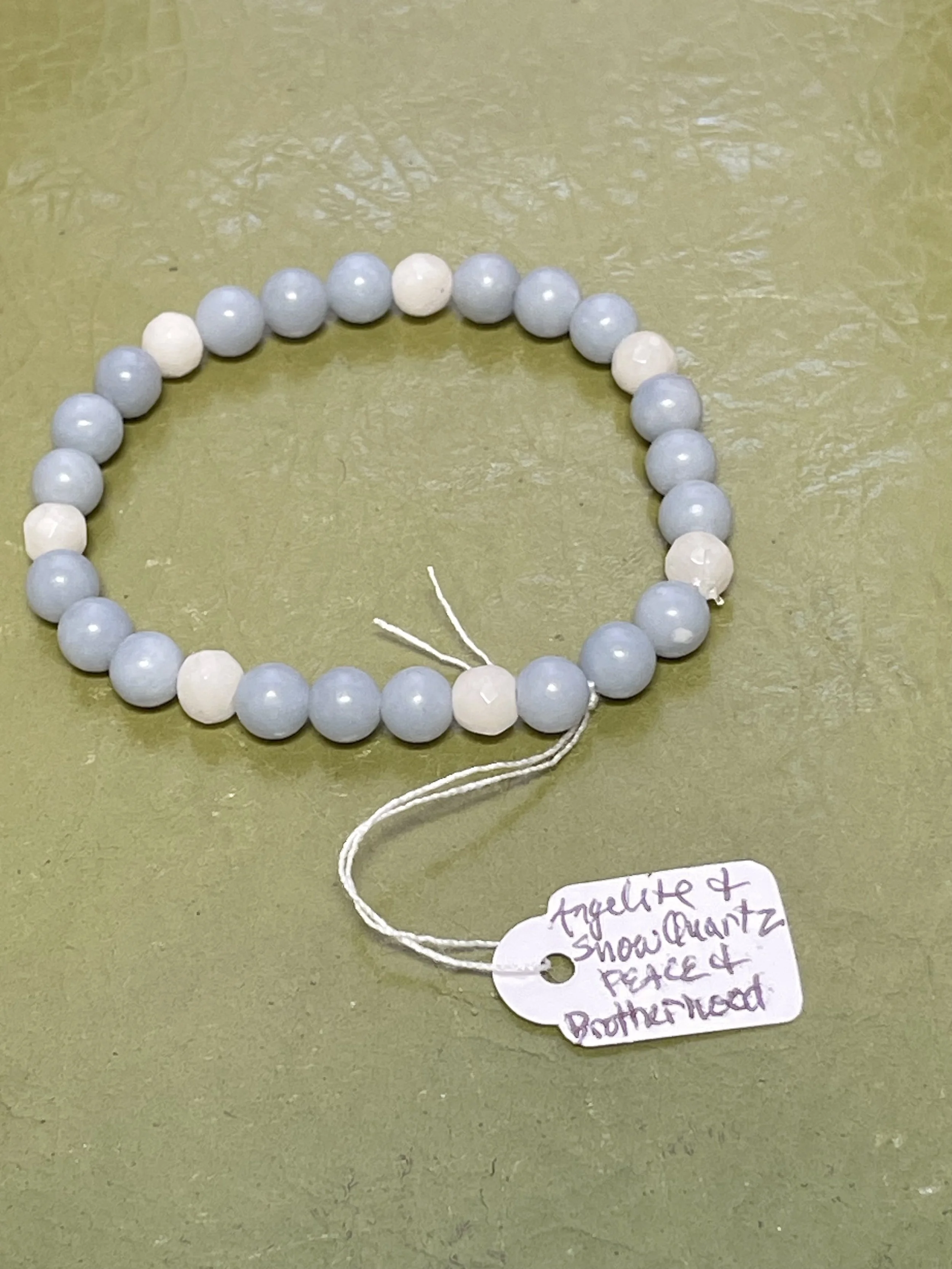 Angelite and Snow Quartz energy bracelet.jpg