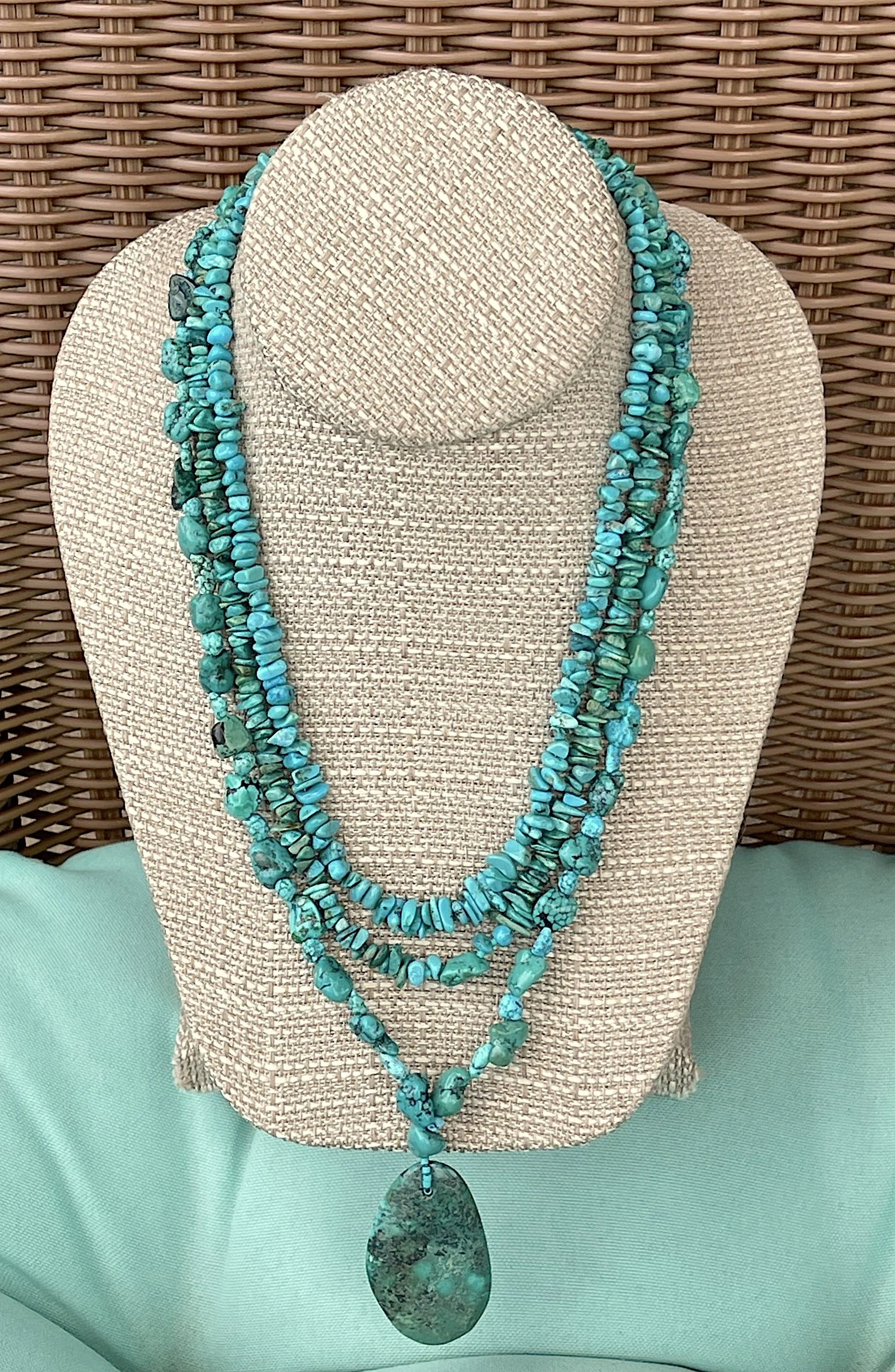 Turquoise Valley wicker chair.jpg