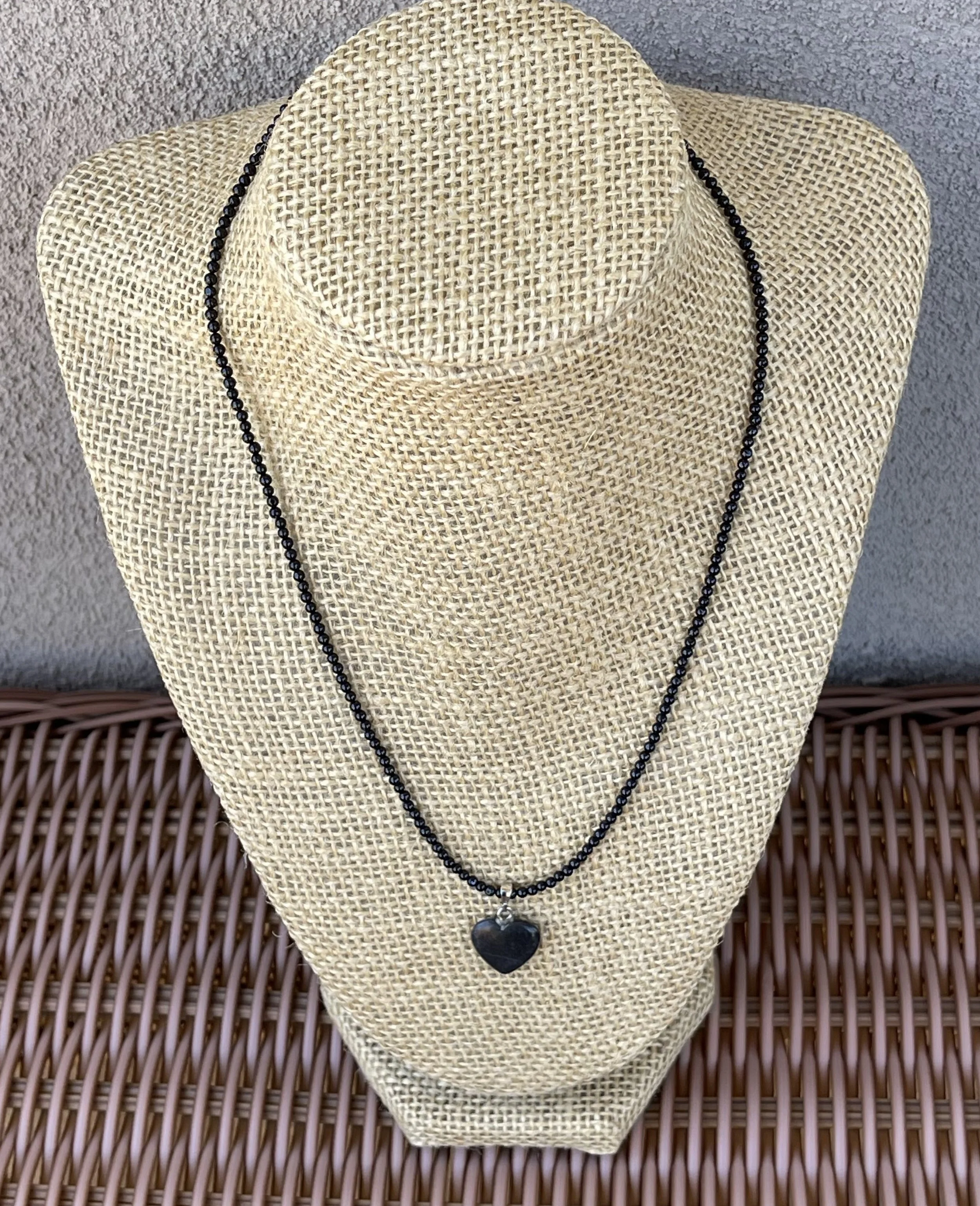 Tourmaline Heart on wicker table.jpg