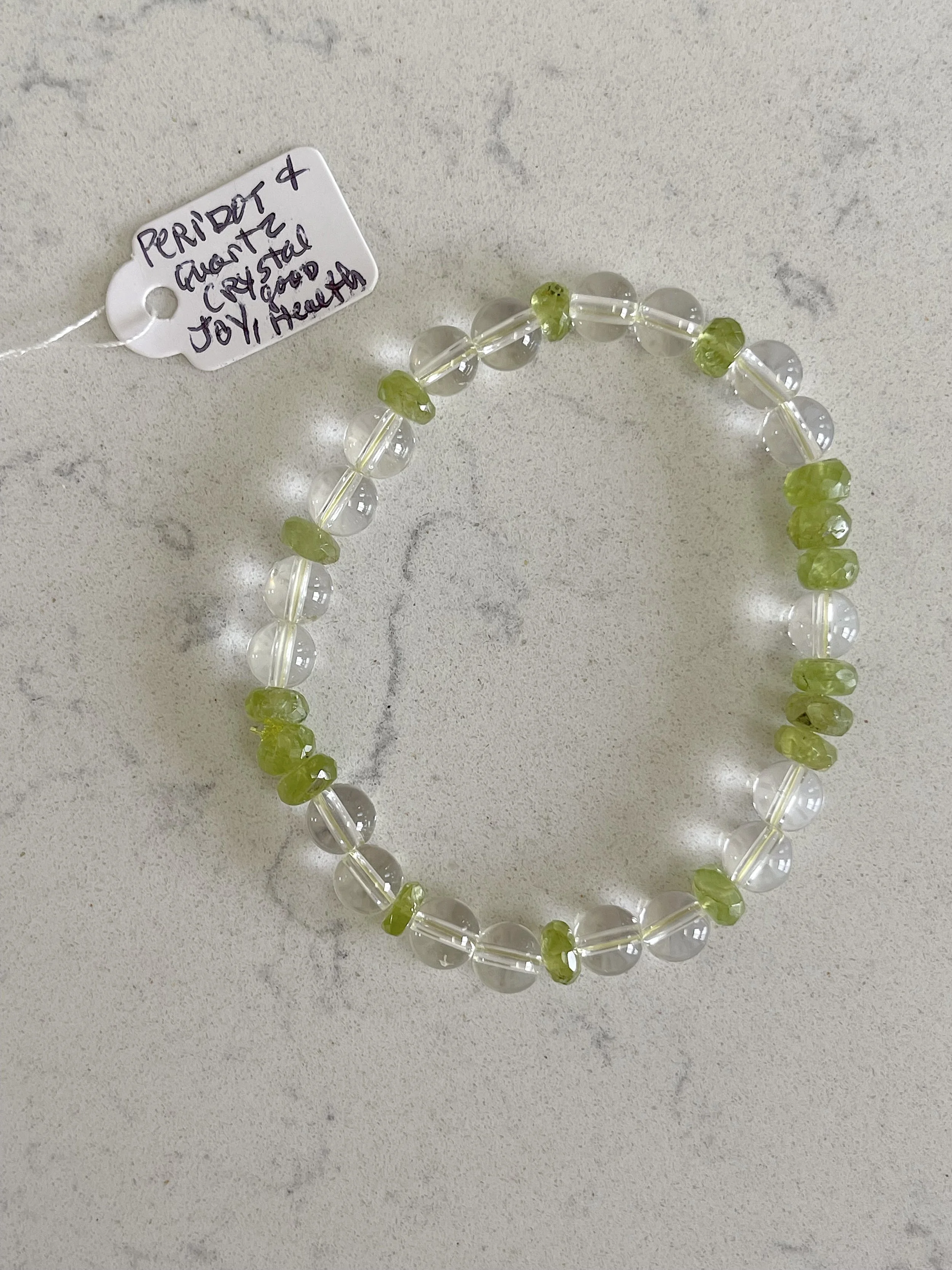 Peridot and quartz energy bracelet.jpg