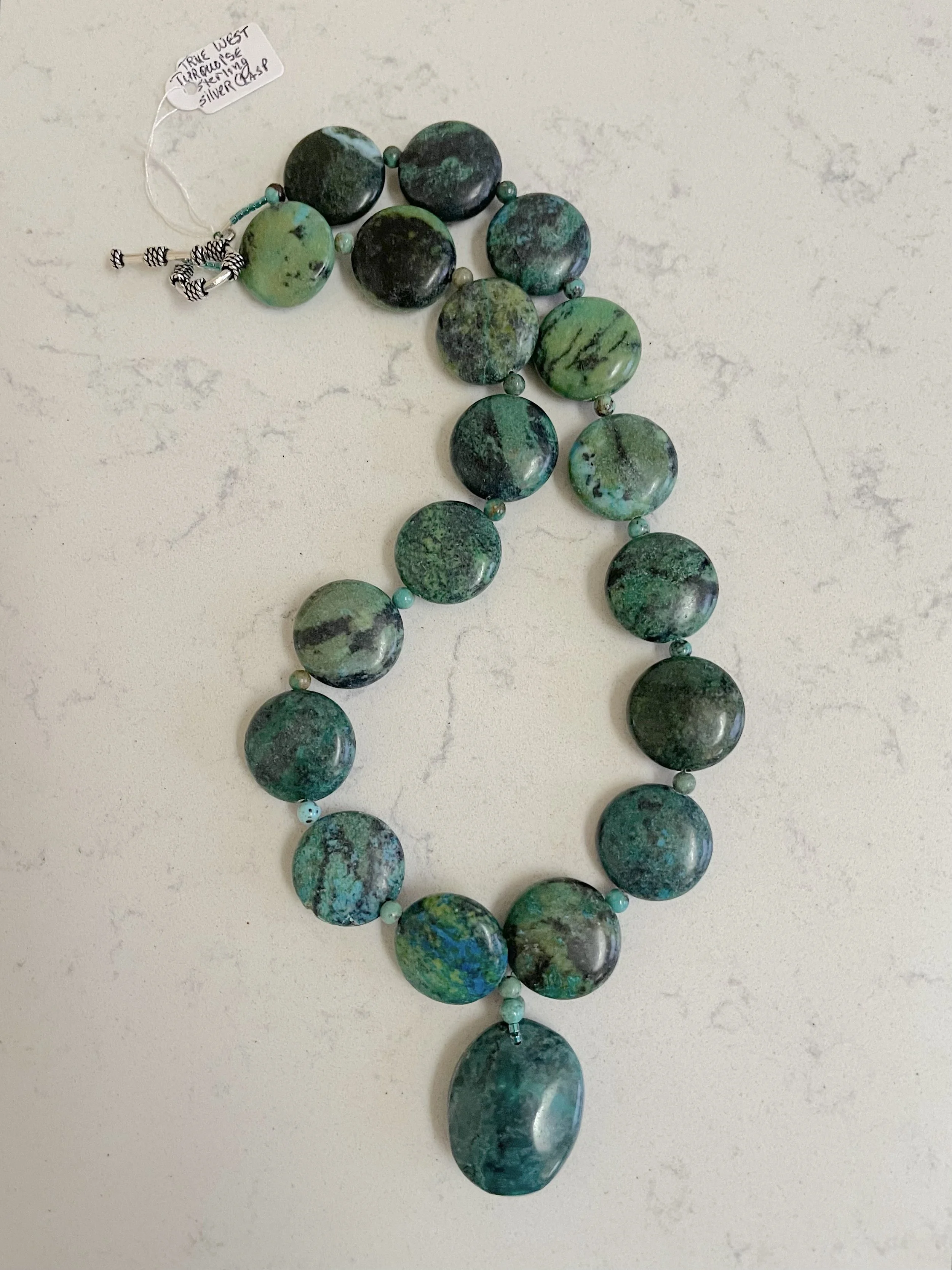 True West-turquoise Discs curved.jpg
