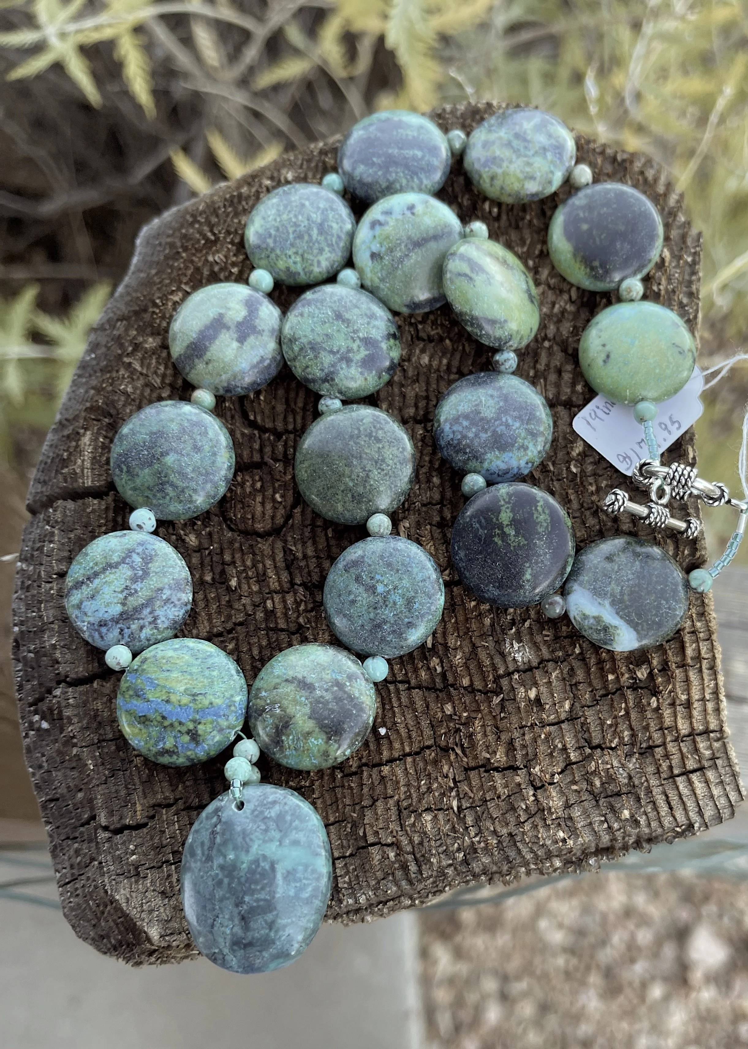Turquoise Discs on post.jpg