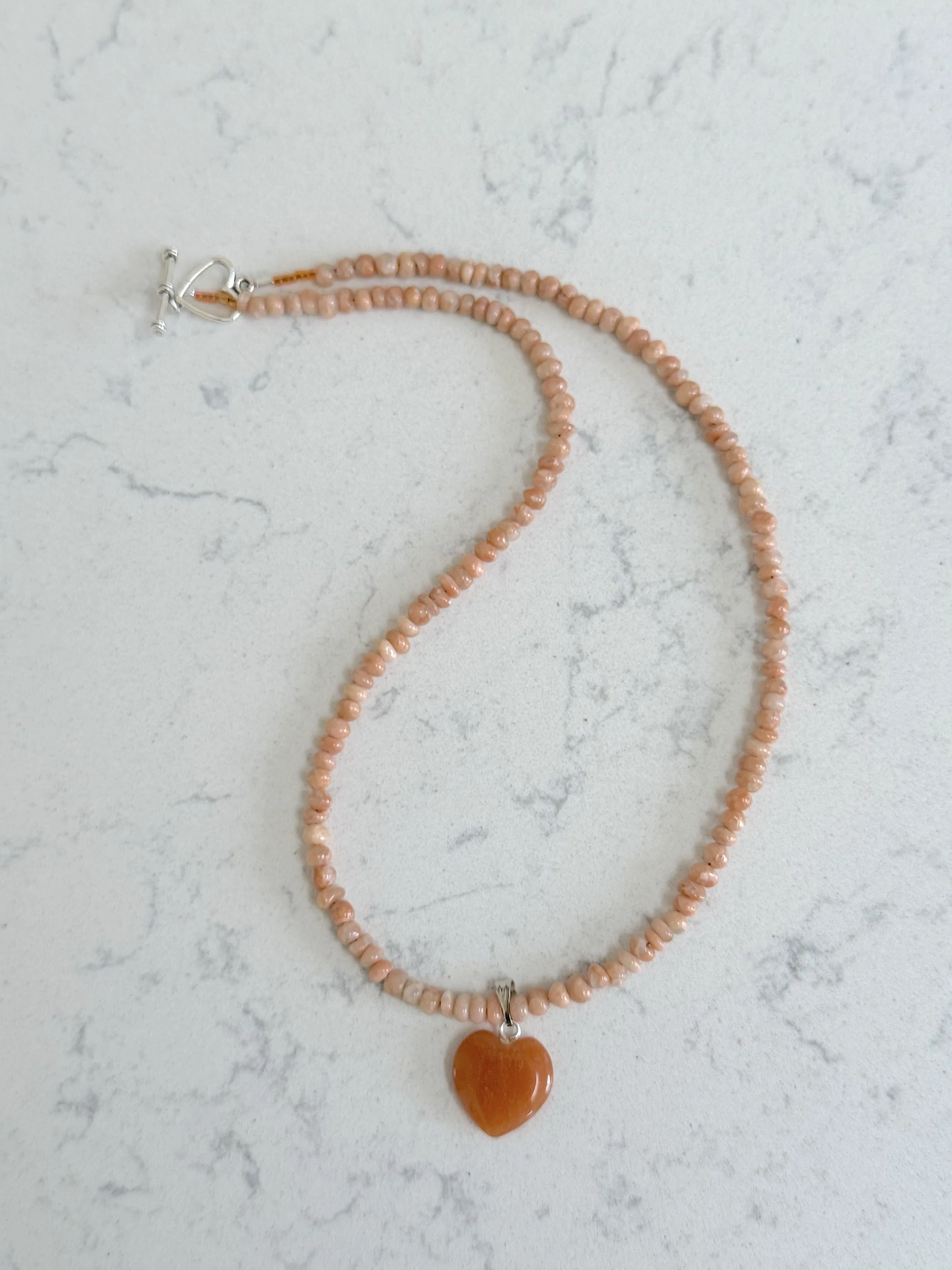 Red Aventurine heart curved.jpg