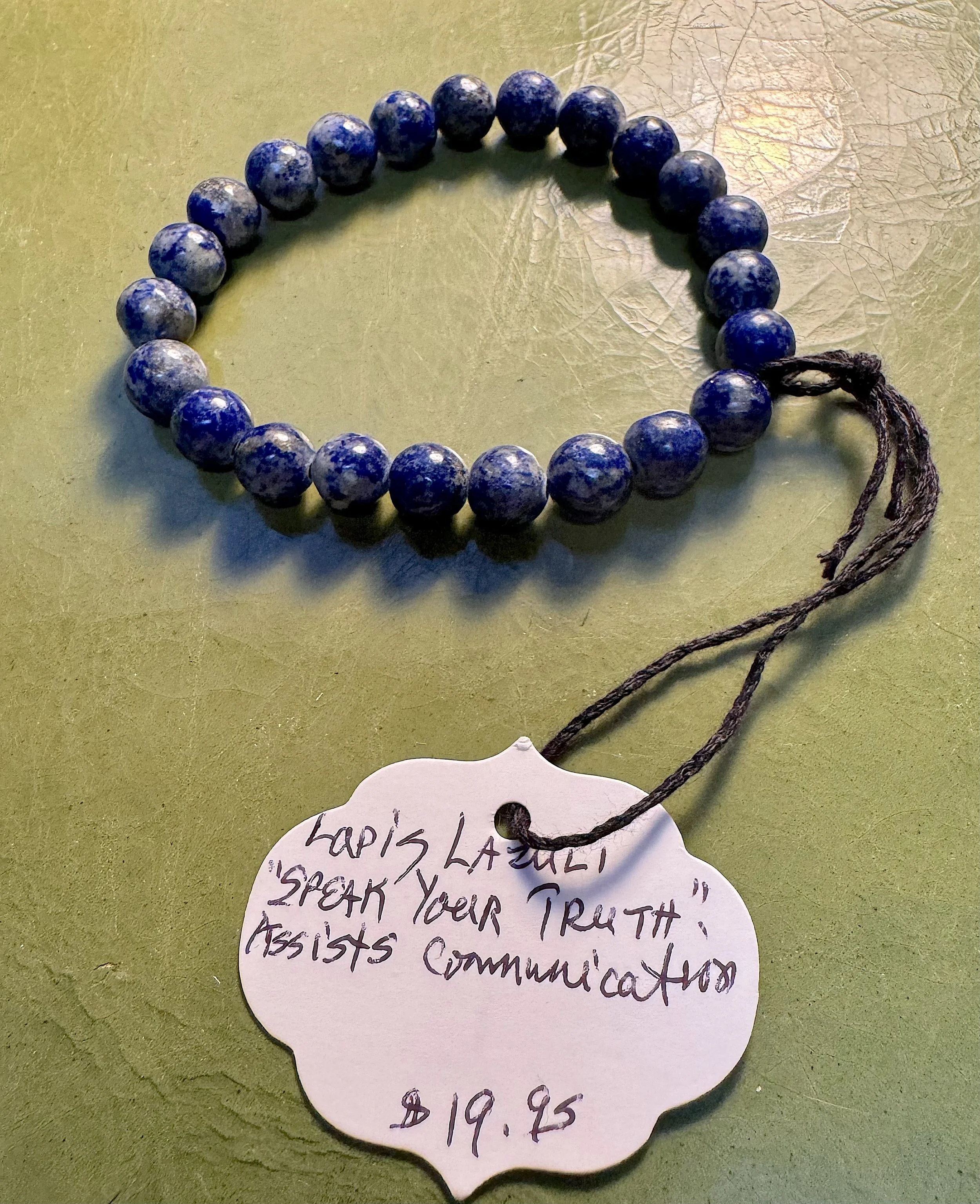Lapis bracelet with tag.jpg