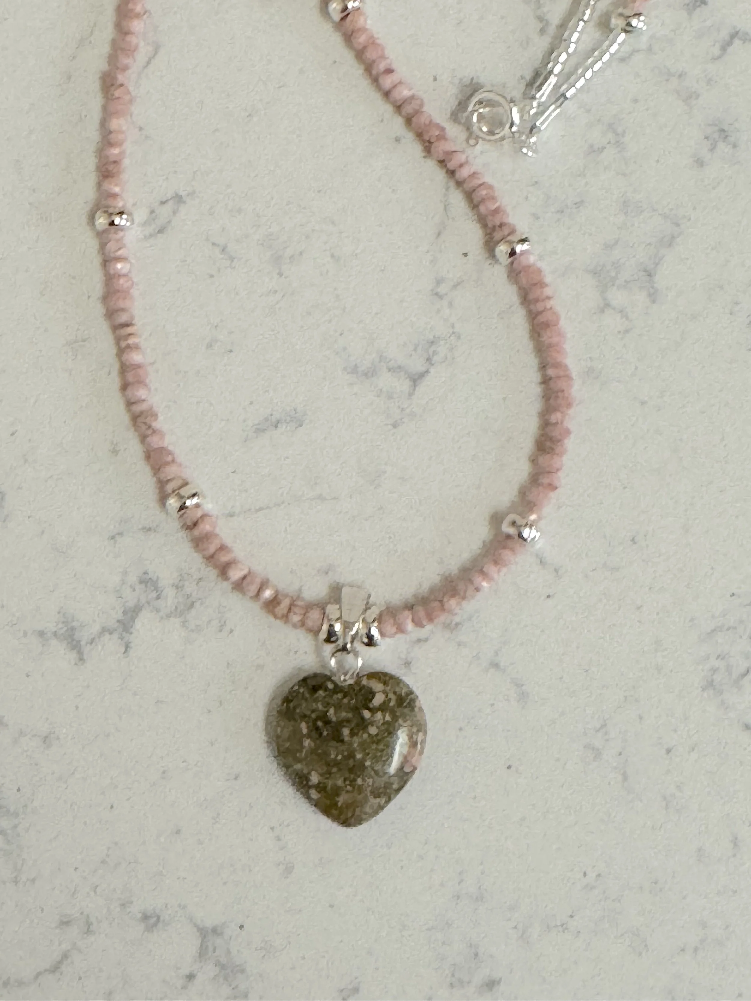 Autumn Jasper heart with Rhodochrosite and Zircon.jpg