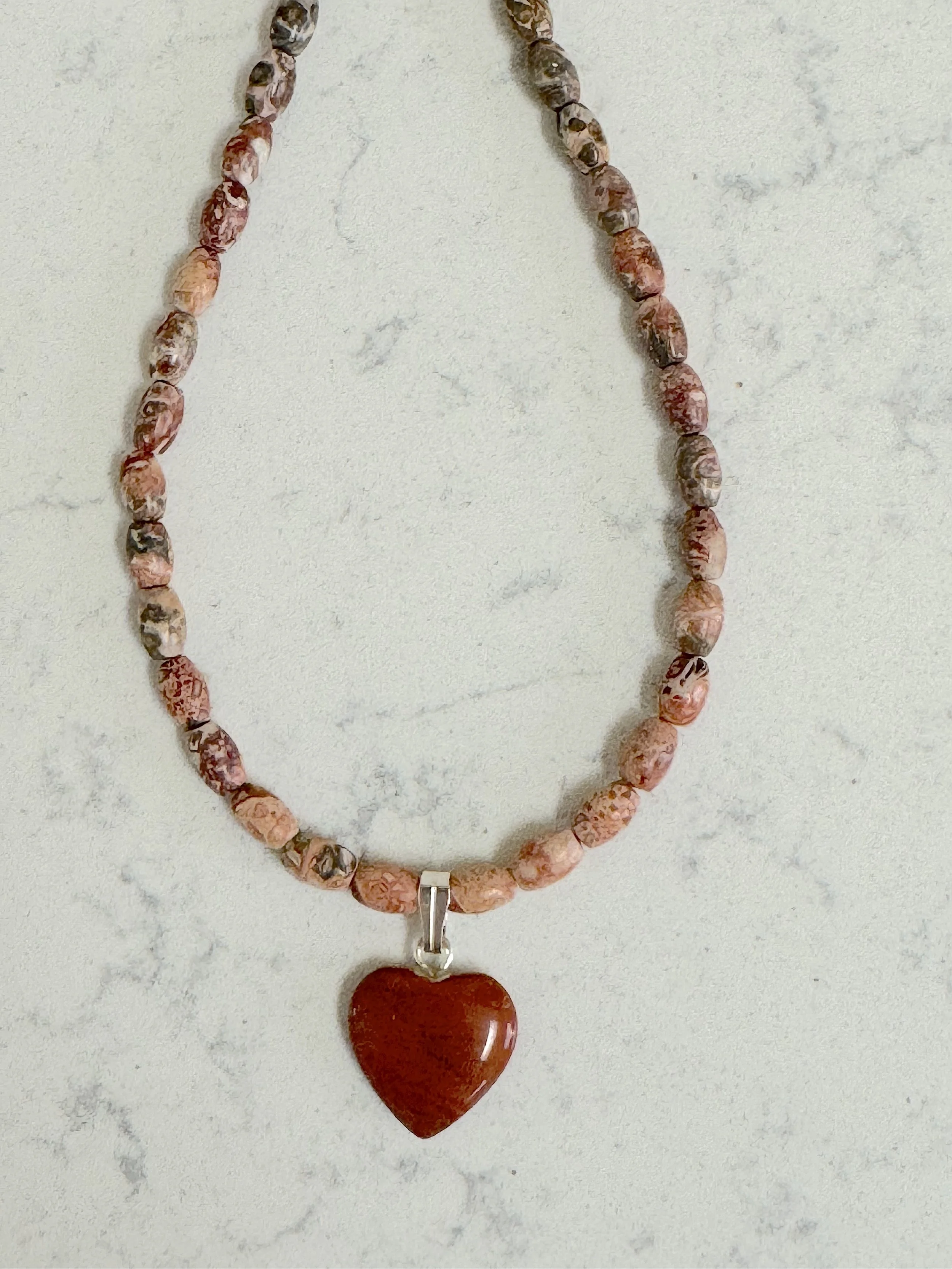Red Jasper heart with Leopard Jasper closeup.jpg
