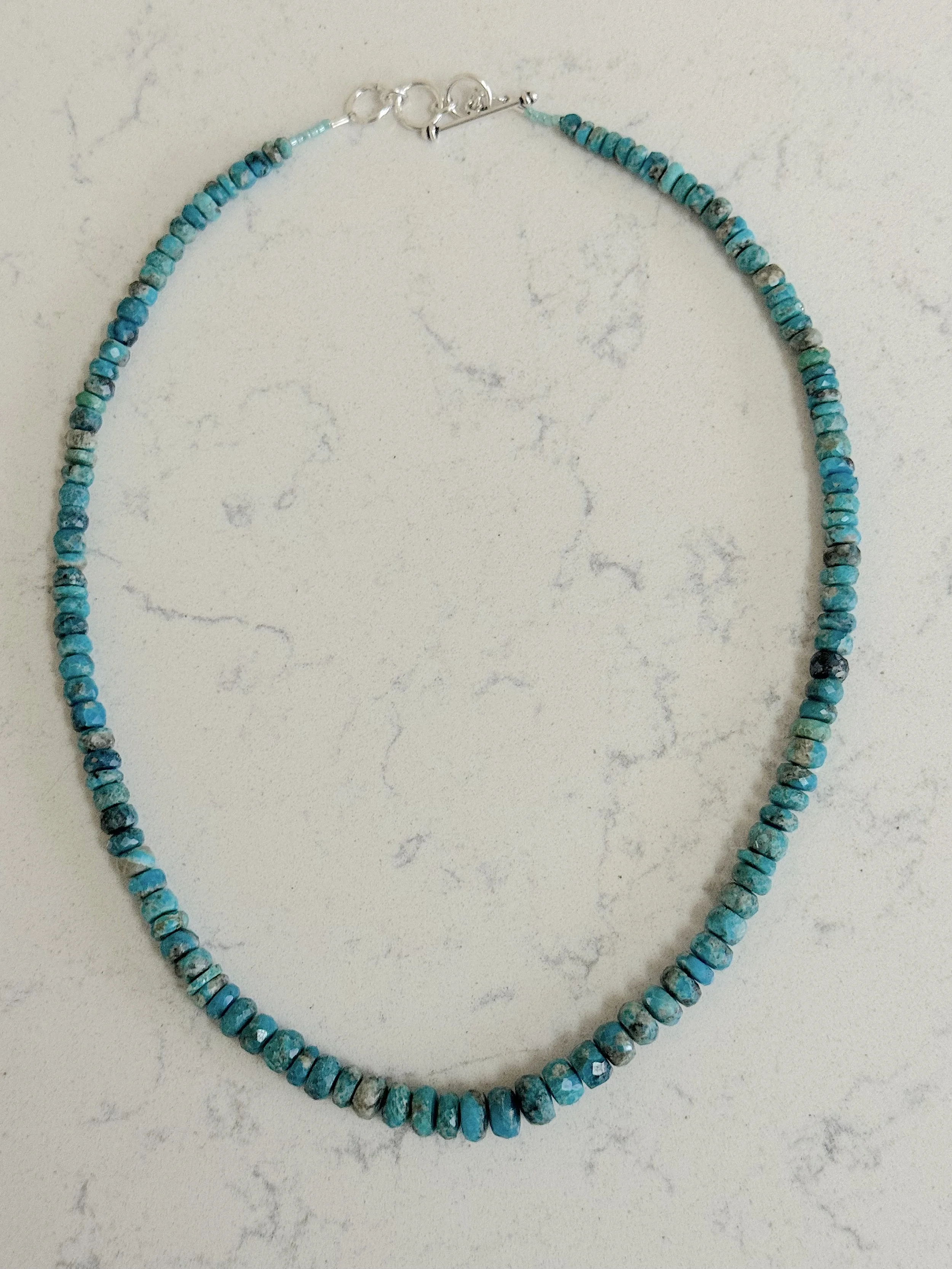 Faceted Graduated Turquoise on quartz.jpg