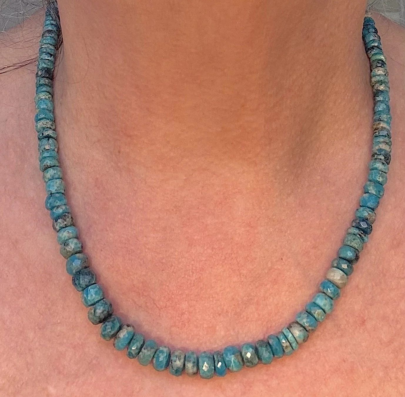 Faceted Graduated Turquoise on me.jpg