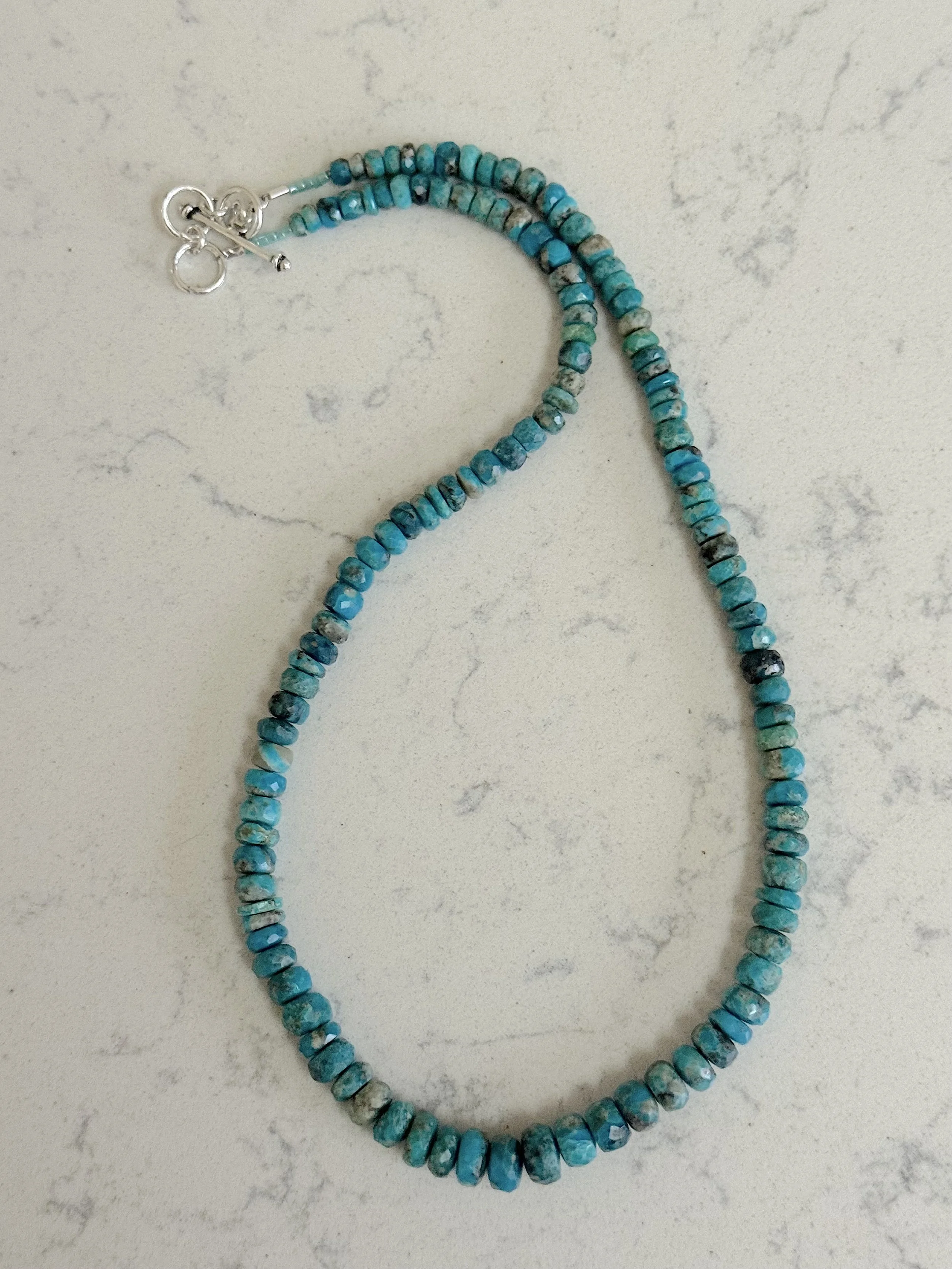 Faceted Graduated Turquoise curved.jpg