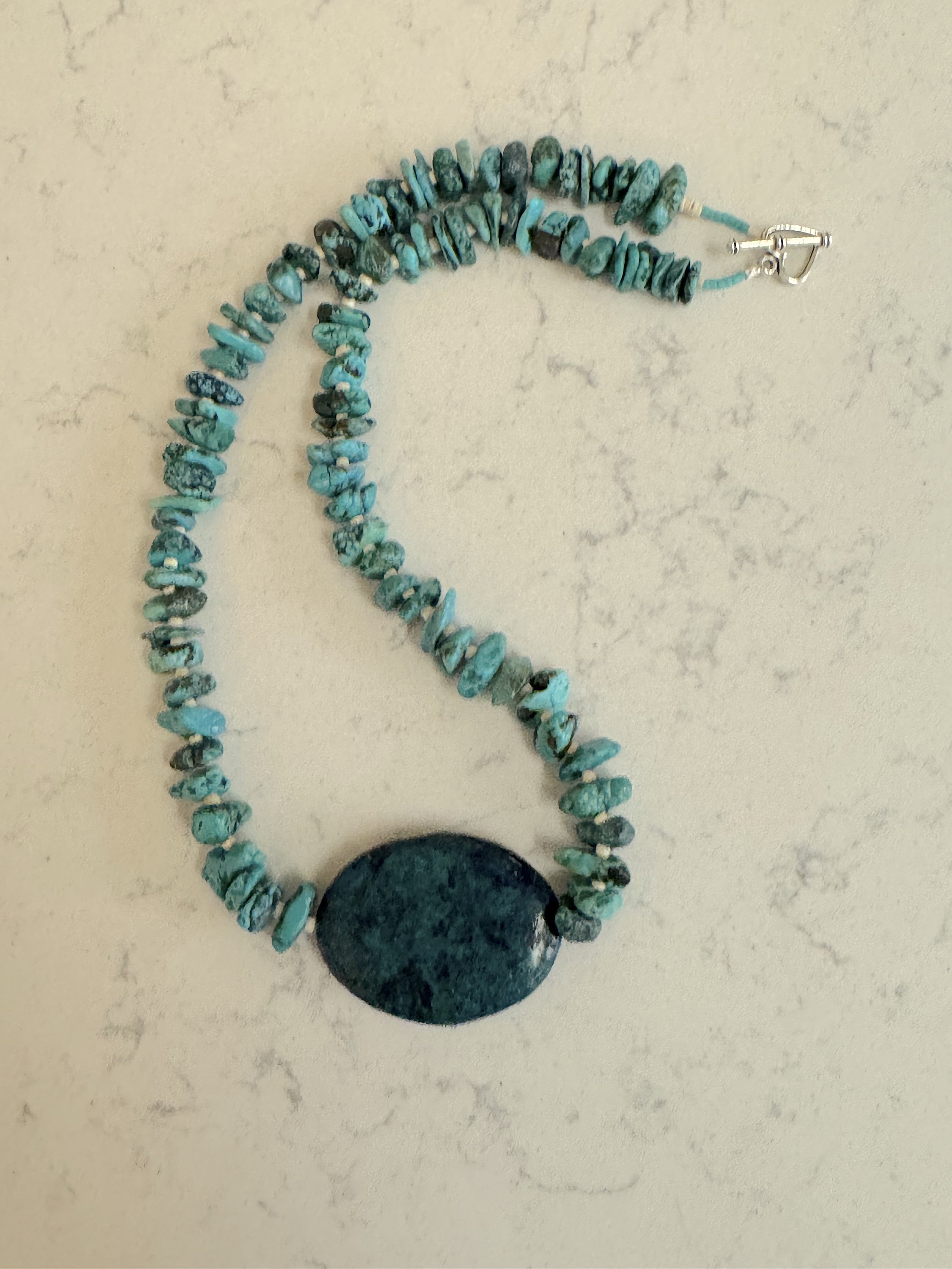 Clam Shell Heishi and Turq. curved.jpg