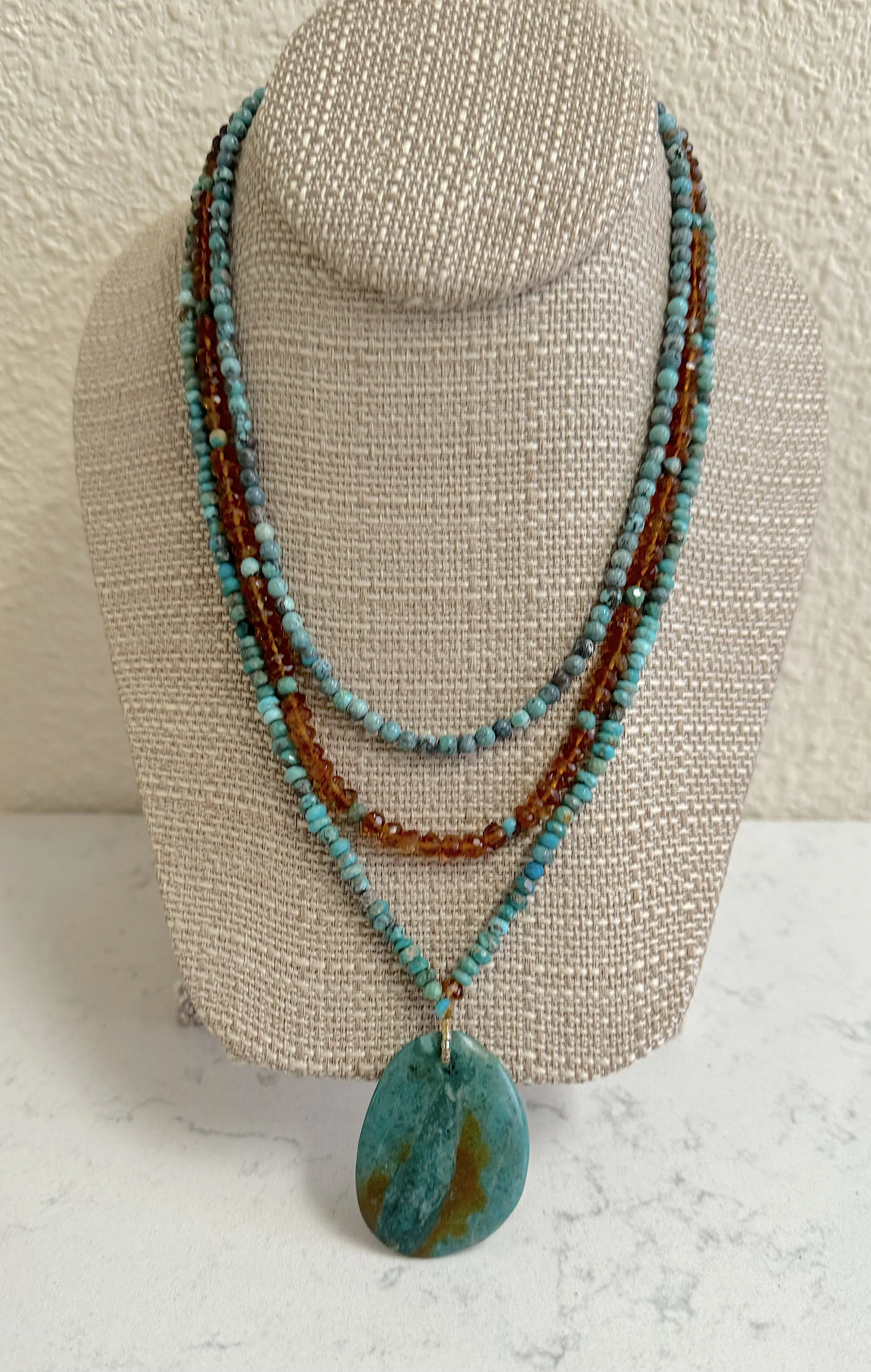 Path Less Taken on stand inside.jpg