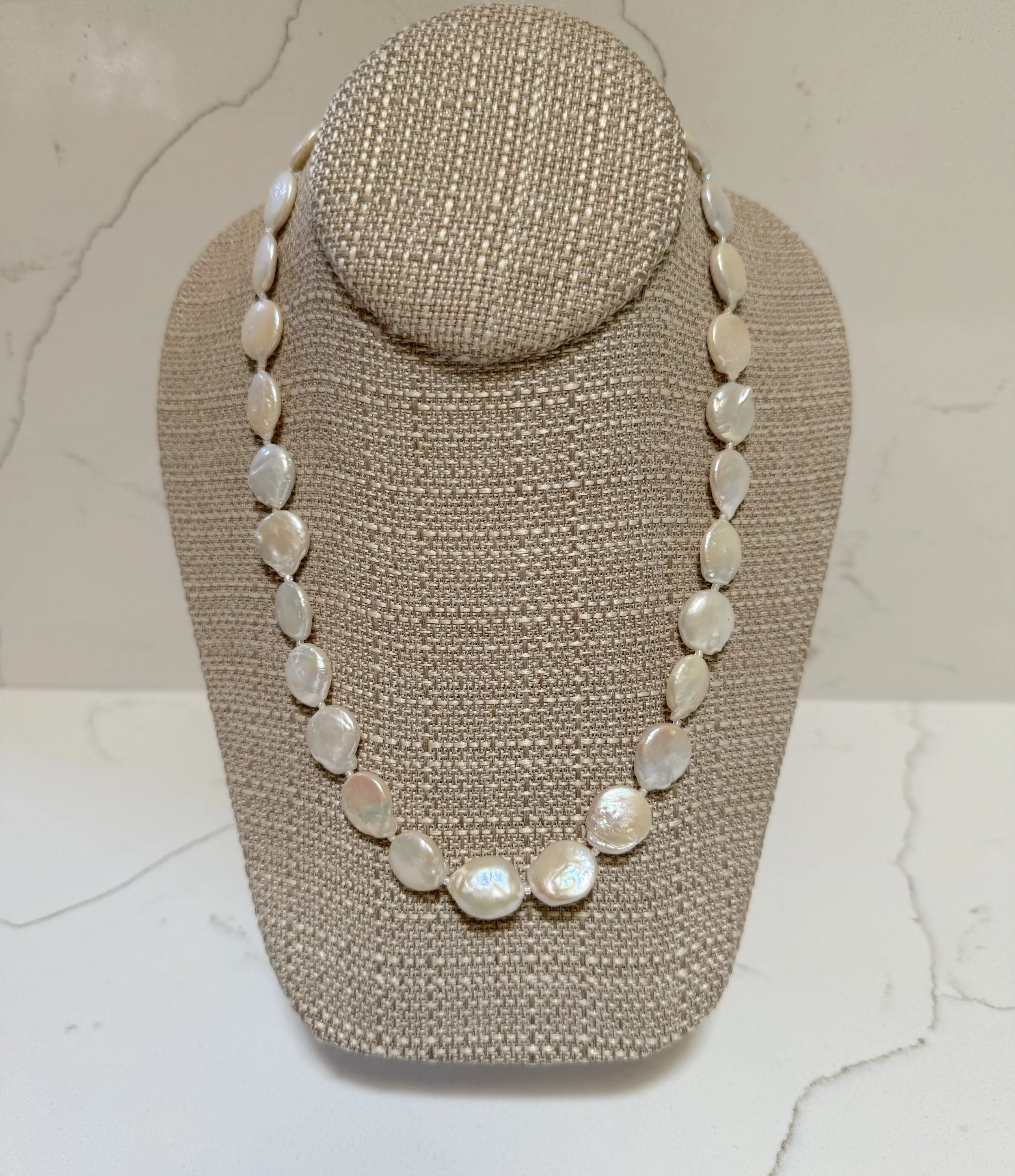 White Coins on stand:quartz.jpg