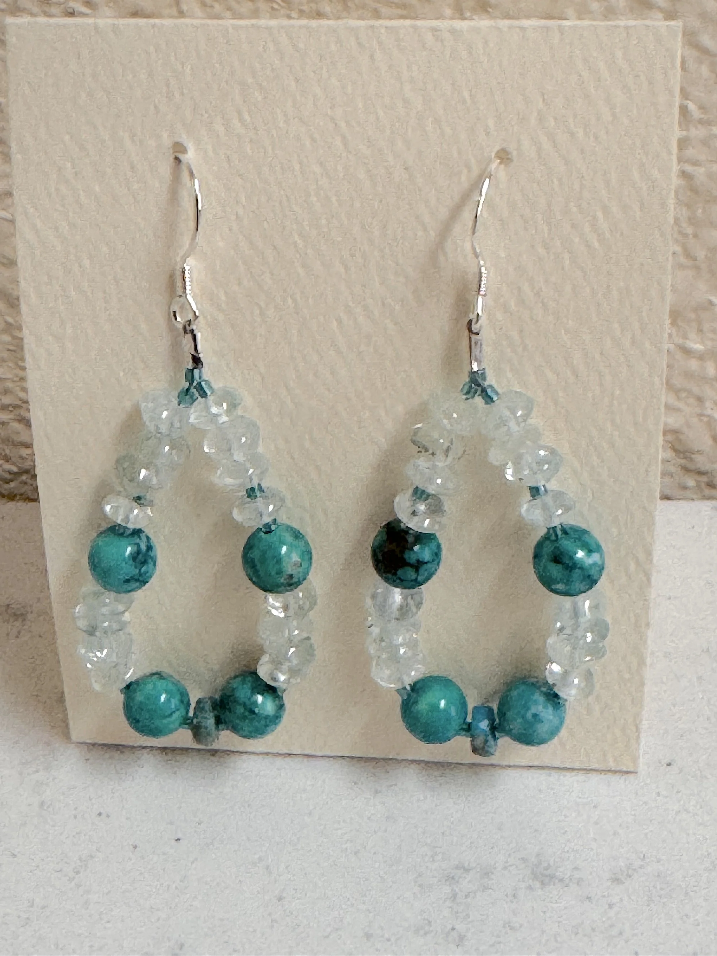 Aquamarine ad Turq hoops on stand:quartz.jpeg