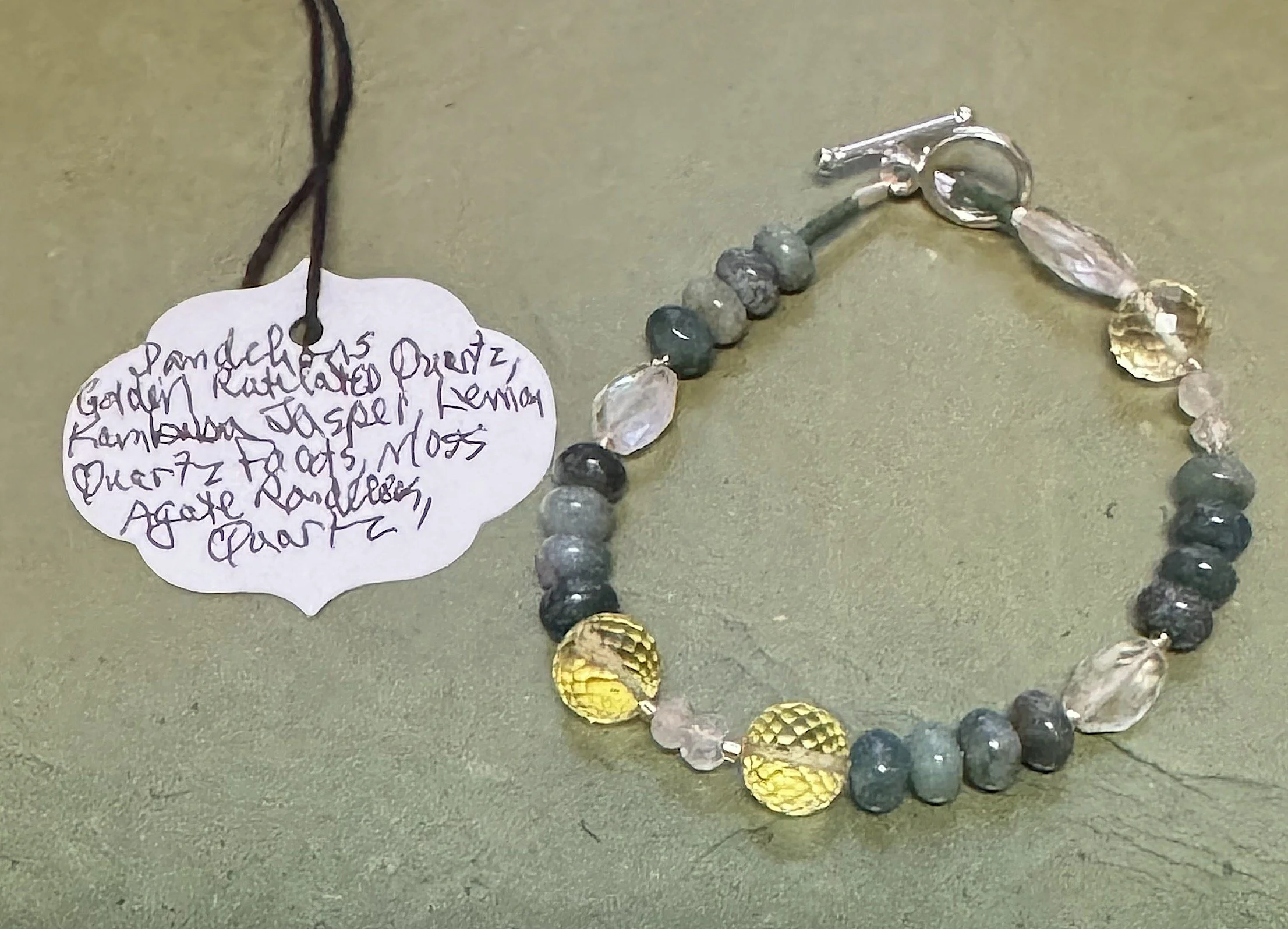 Dandelion bracelet with tag.jpeg