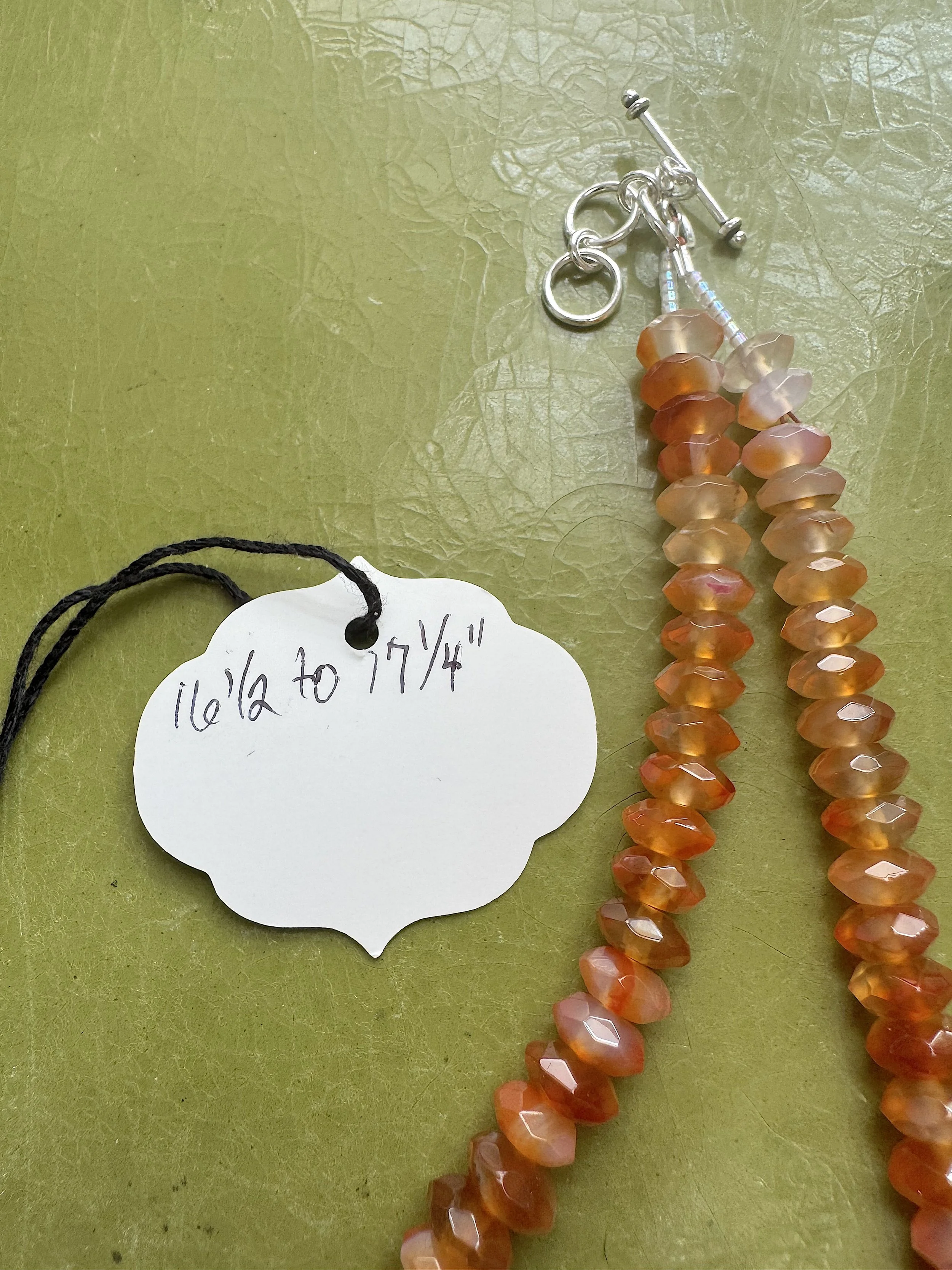 Faceted Carnelian lenth tag.jpg