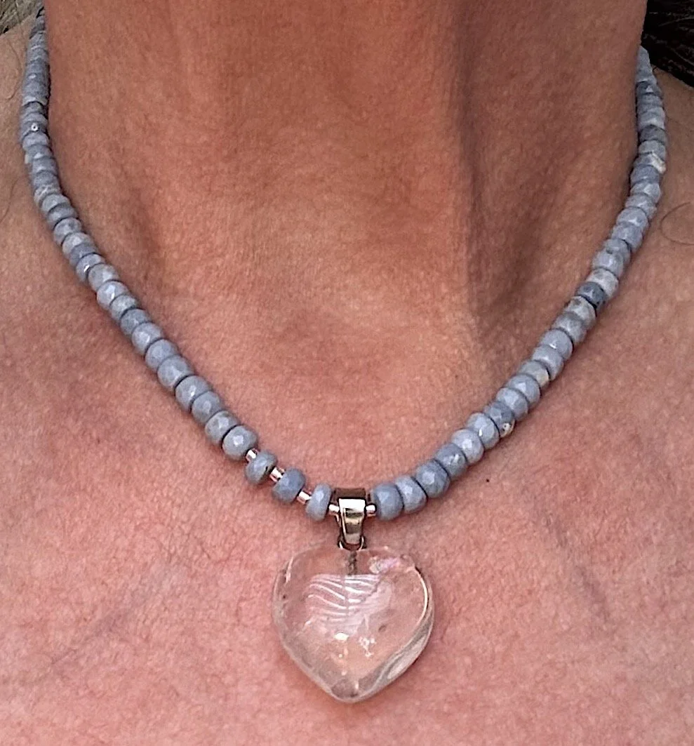 Faceted Blue Opal and clear quartz heart on me.jpg