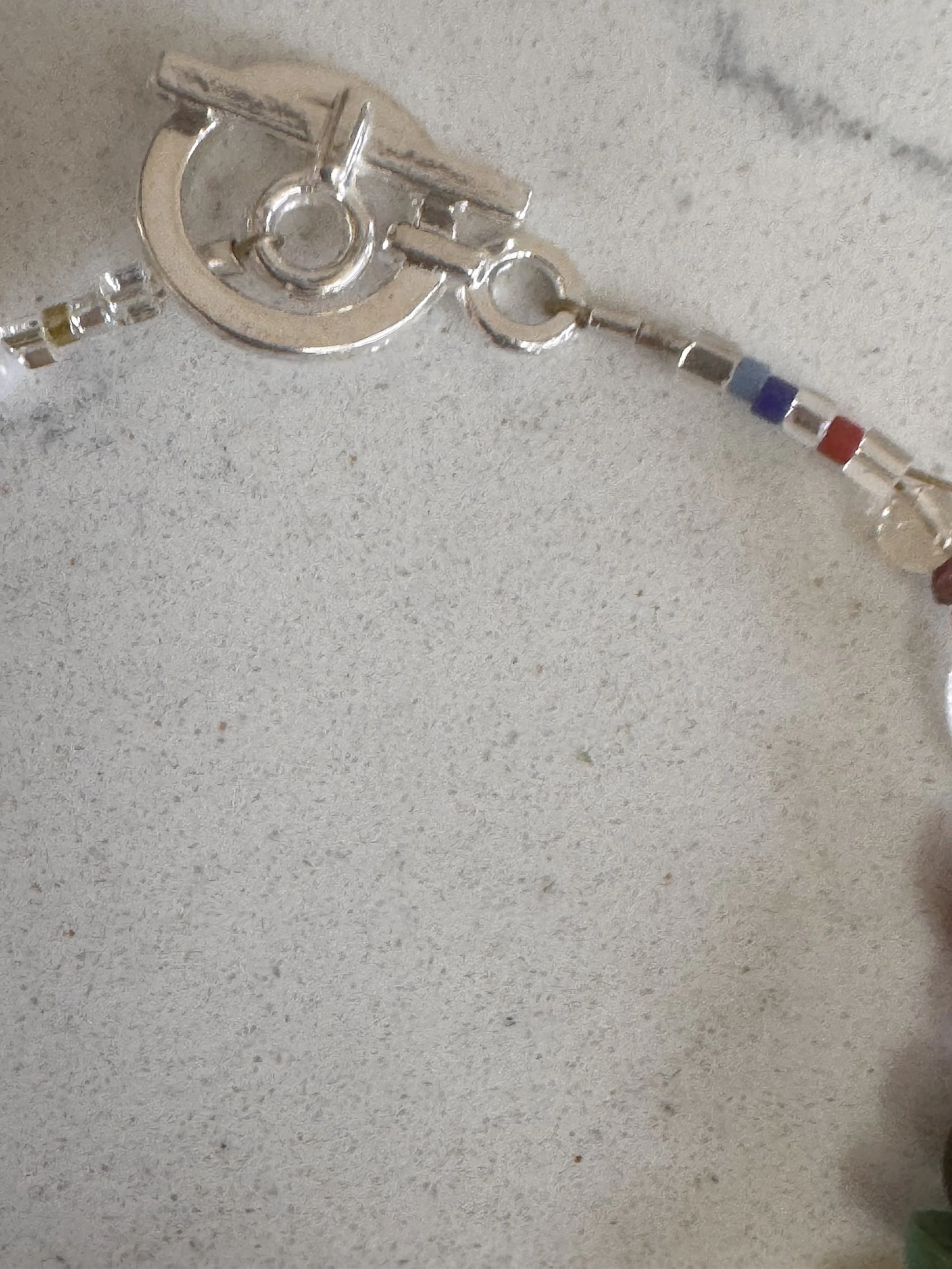 Everything Odds and Ends brace.et clasp-Amethyst center.jpeg