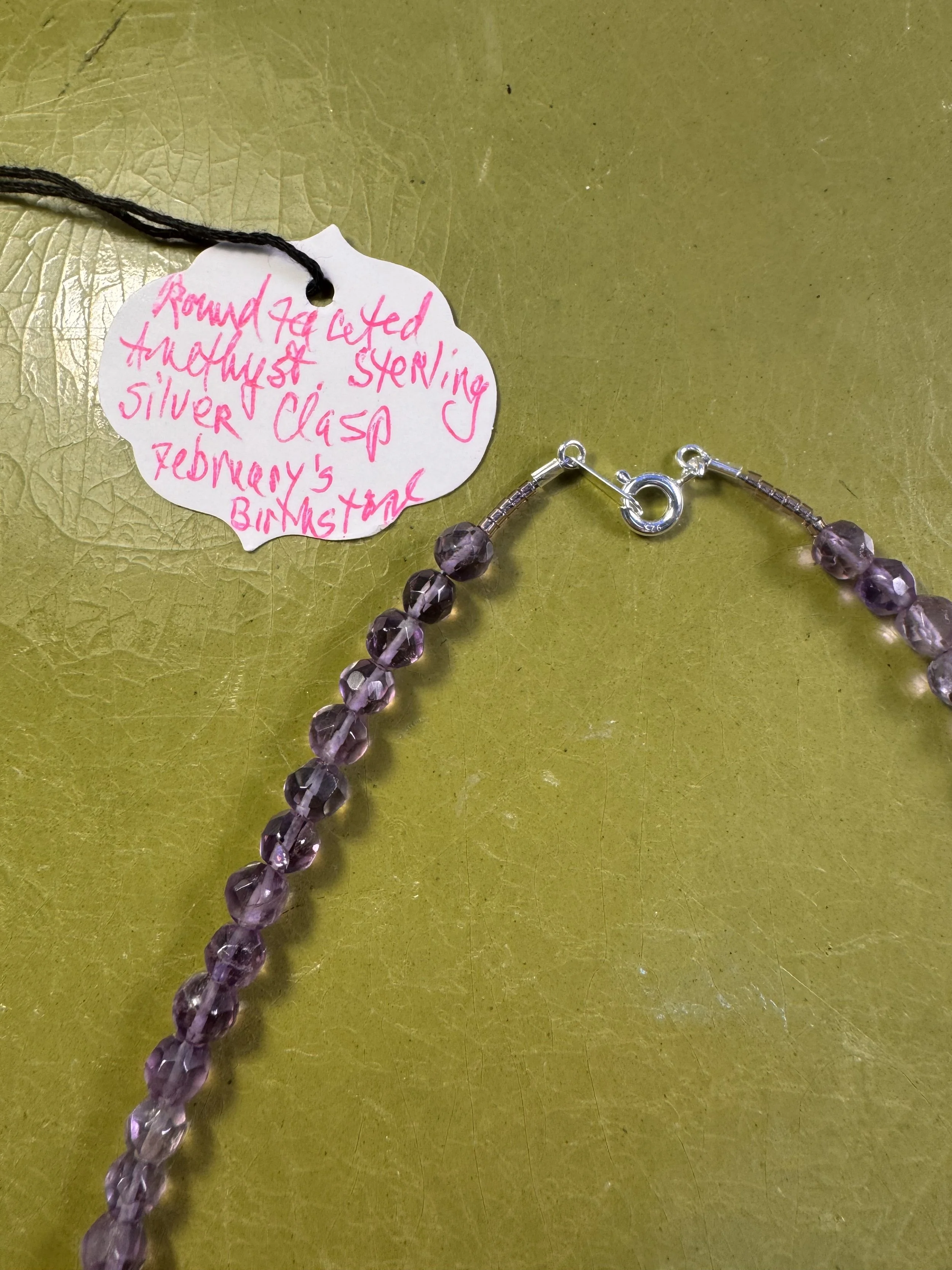 Round Faceted Amethyst clasp:tag.jpeg