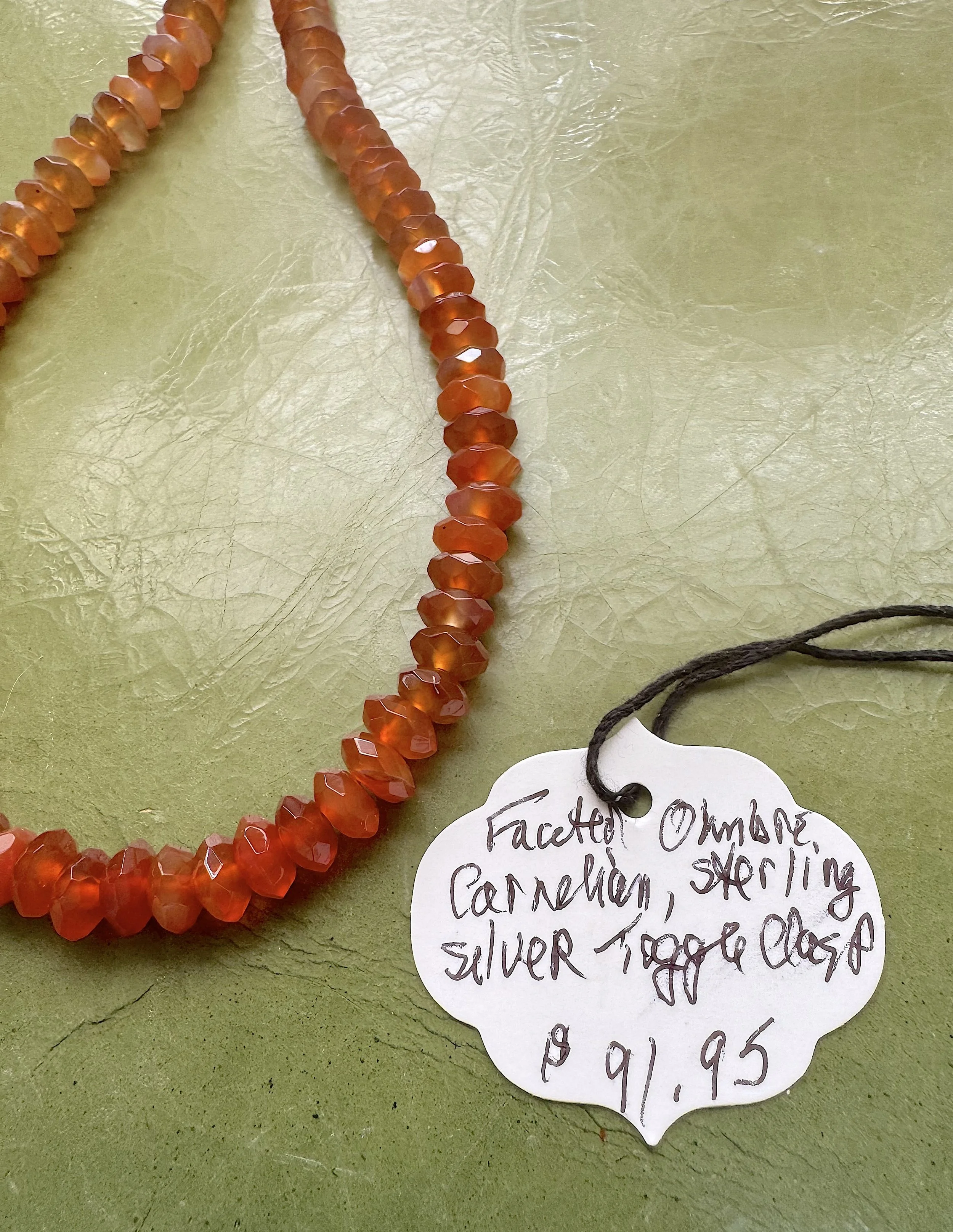 Faceted Carnelian price tag.jpg
