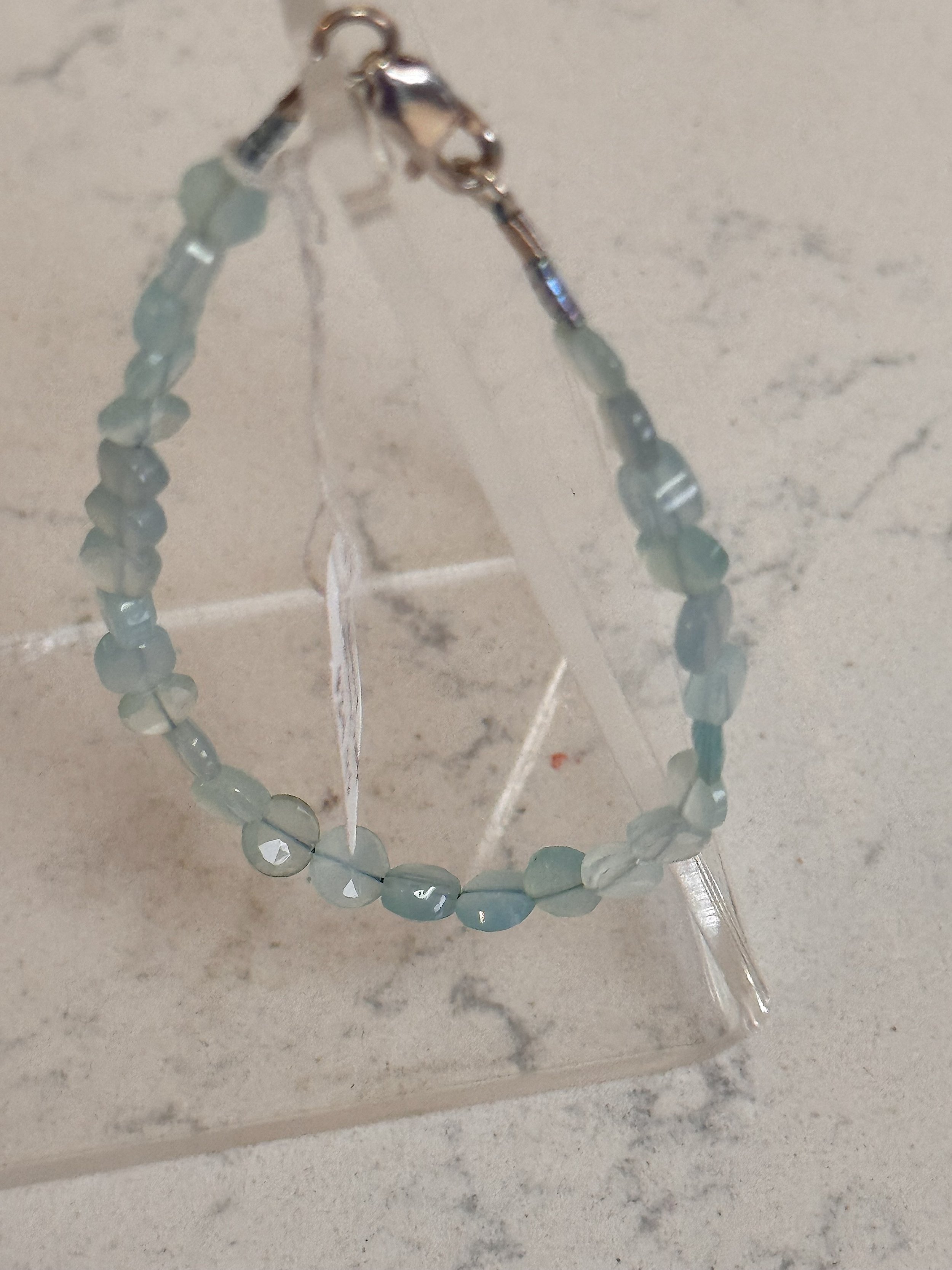 Blue Chalcedony Bracelet on stand.jpeg