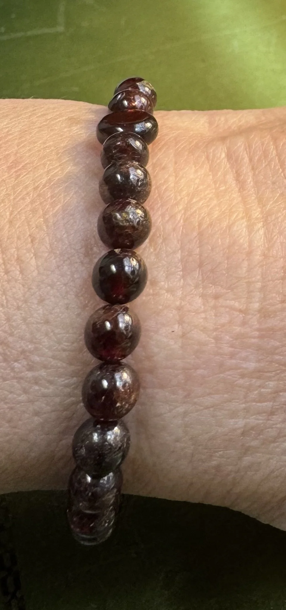 Garnet energy brac. on me.jpg