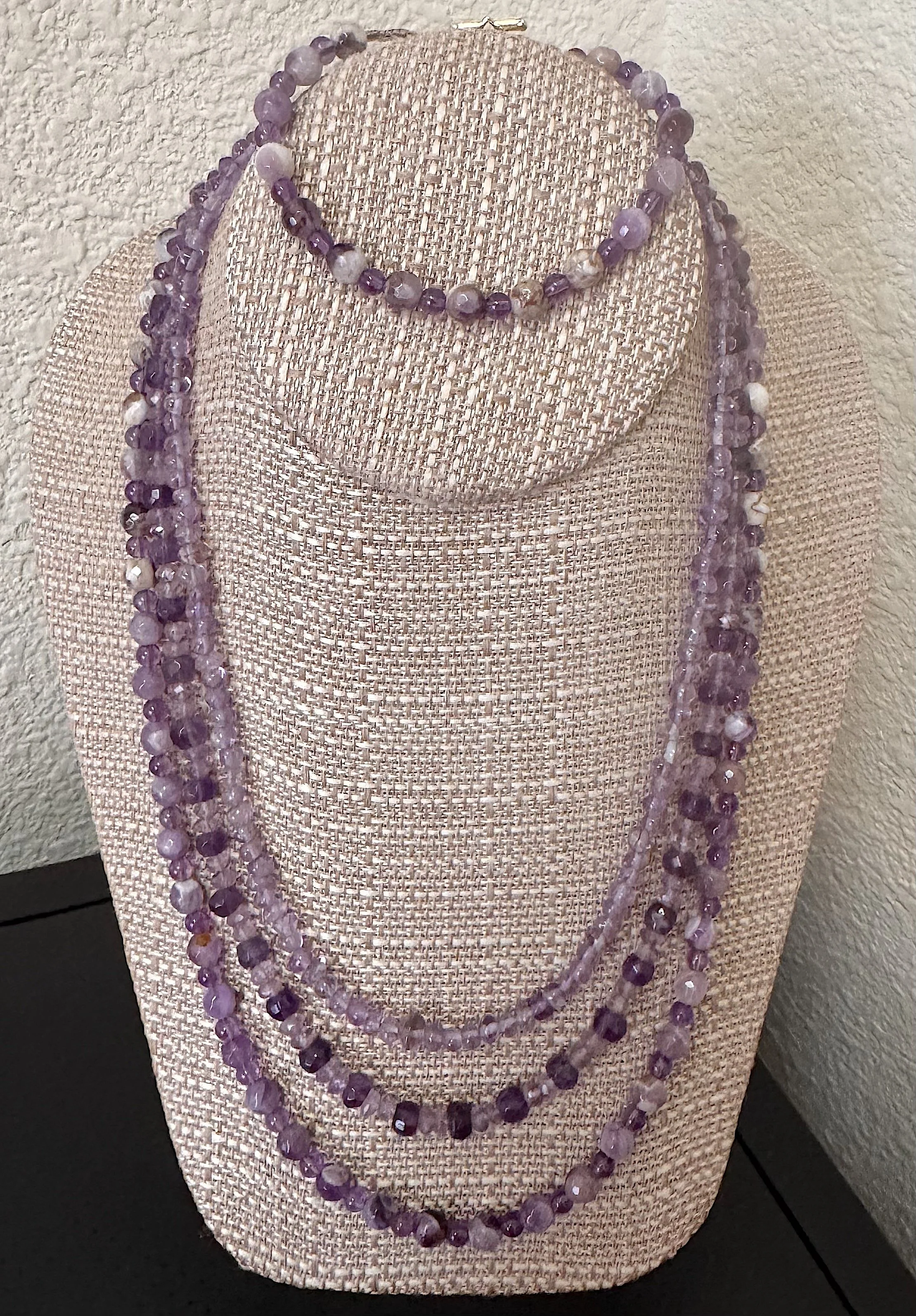 Lavender Amethyst set on stand.jpeg