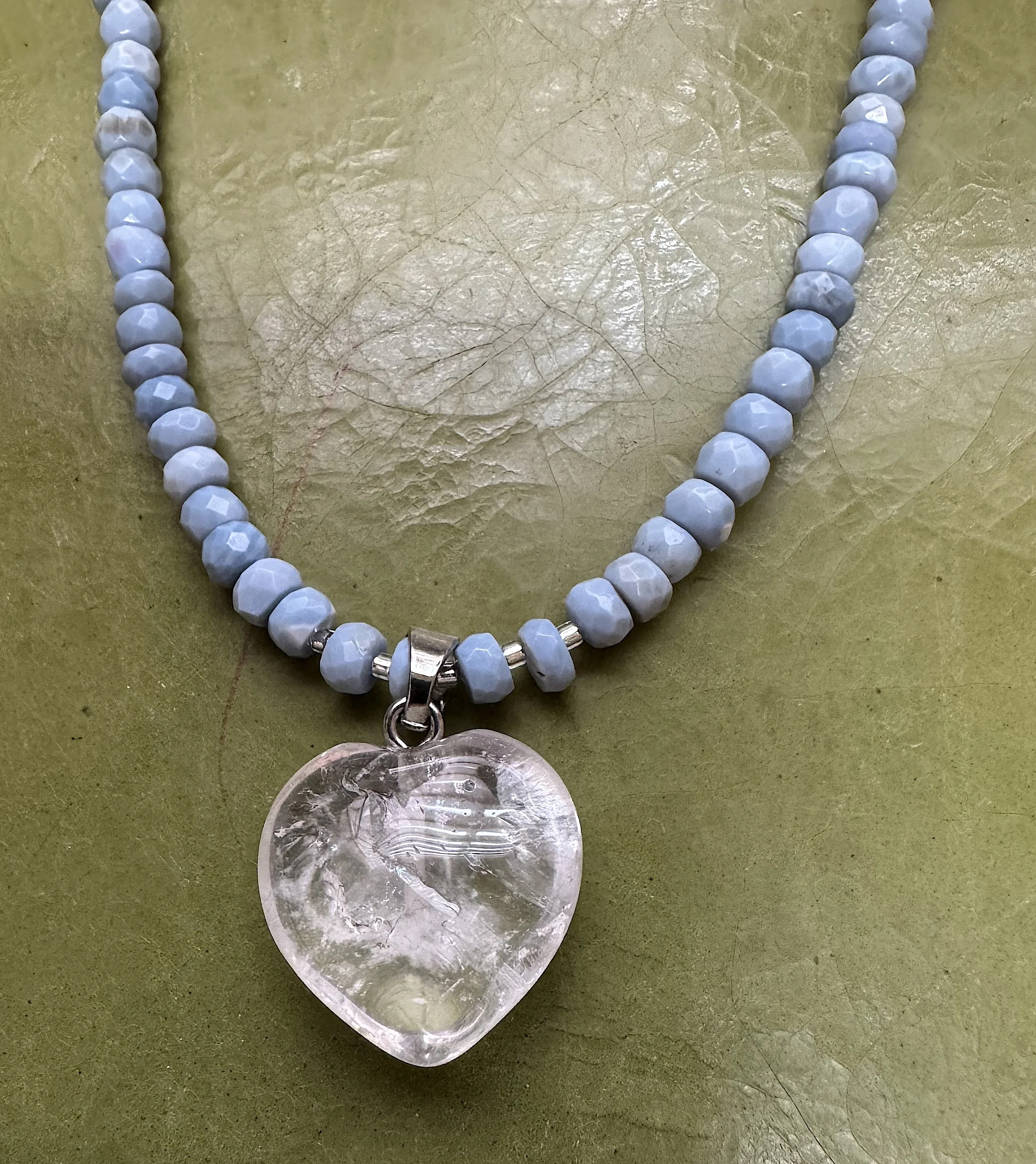 Faceted Blue Opal and clear quartz heart closeup.jpg