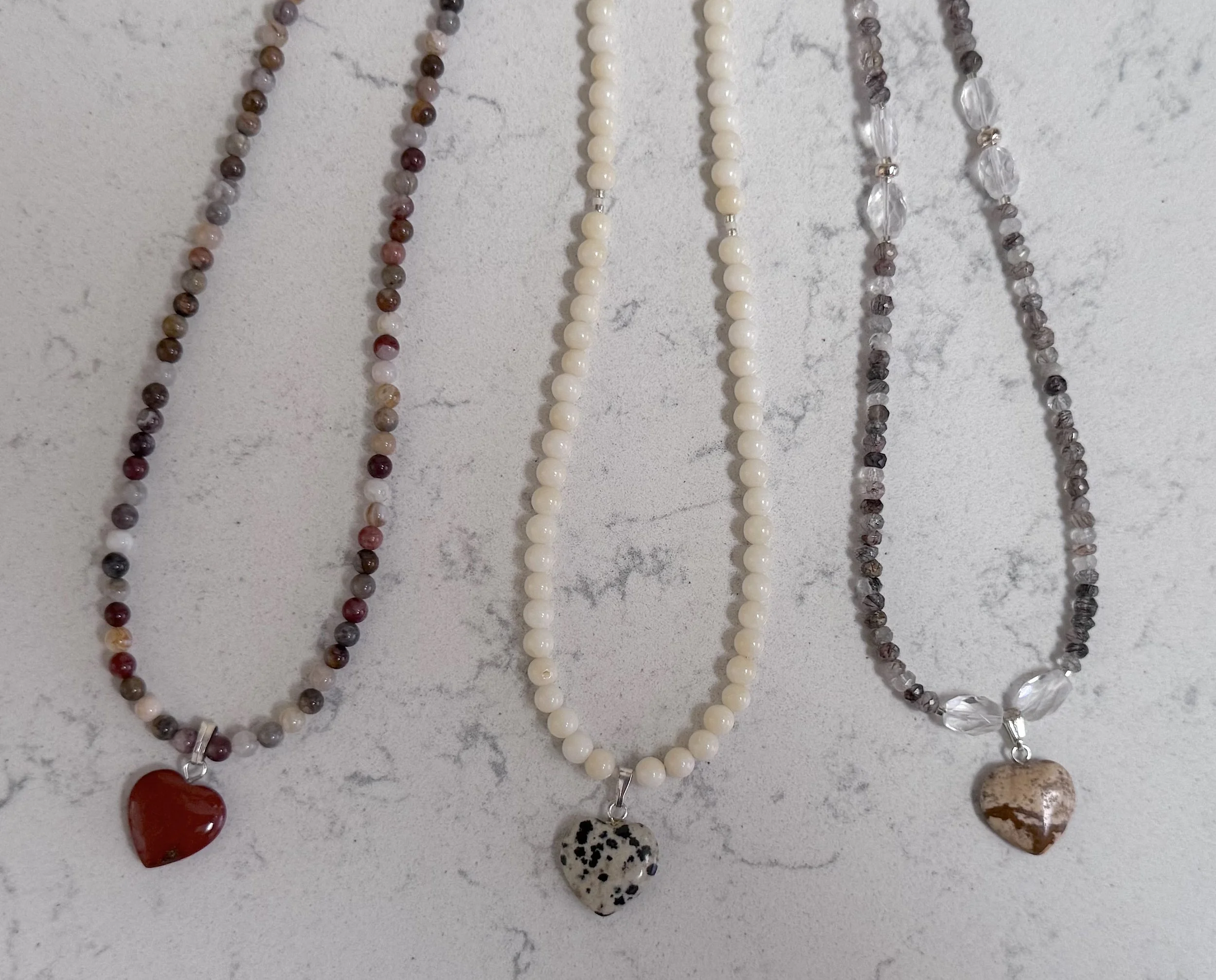 3 heart necklaces closeup 8-15-26.jpeg