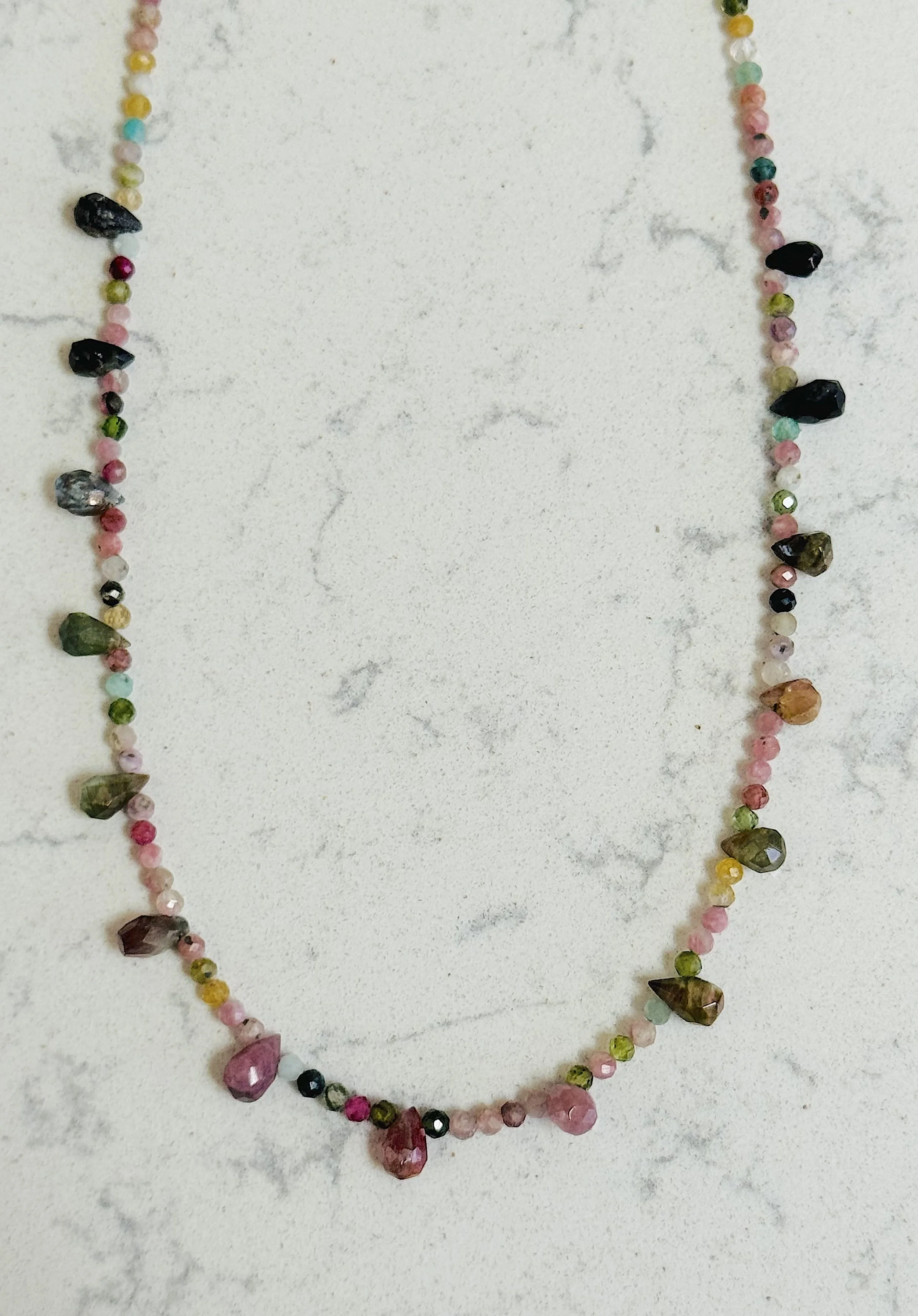faceted Tourmaline closeup on white.jpg