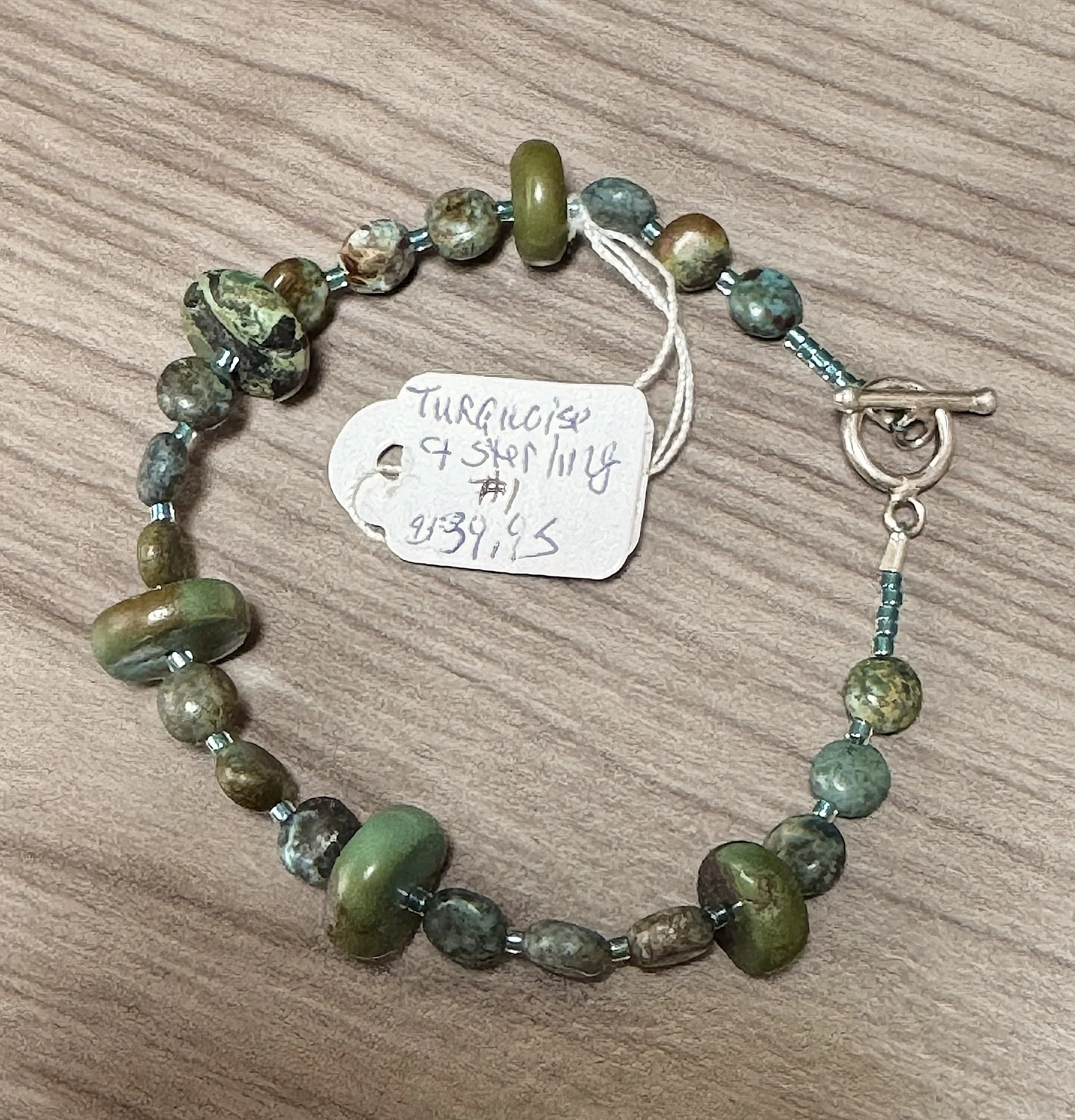 Turquoise coin and disc bracelet price tag.jpeg