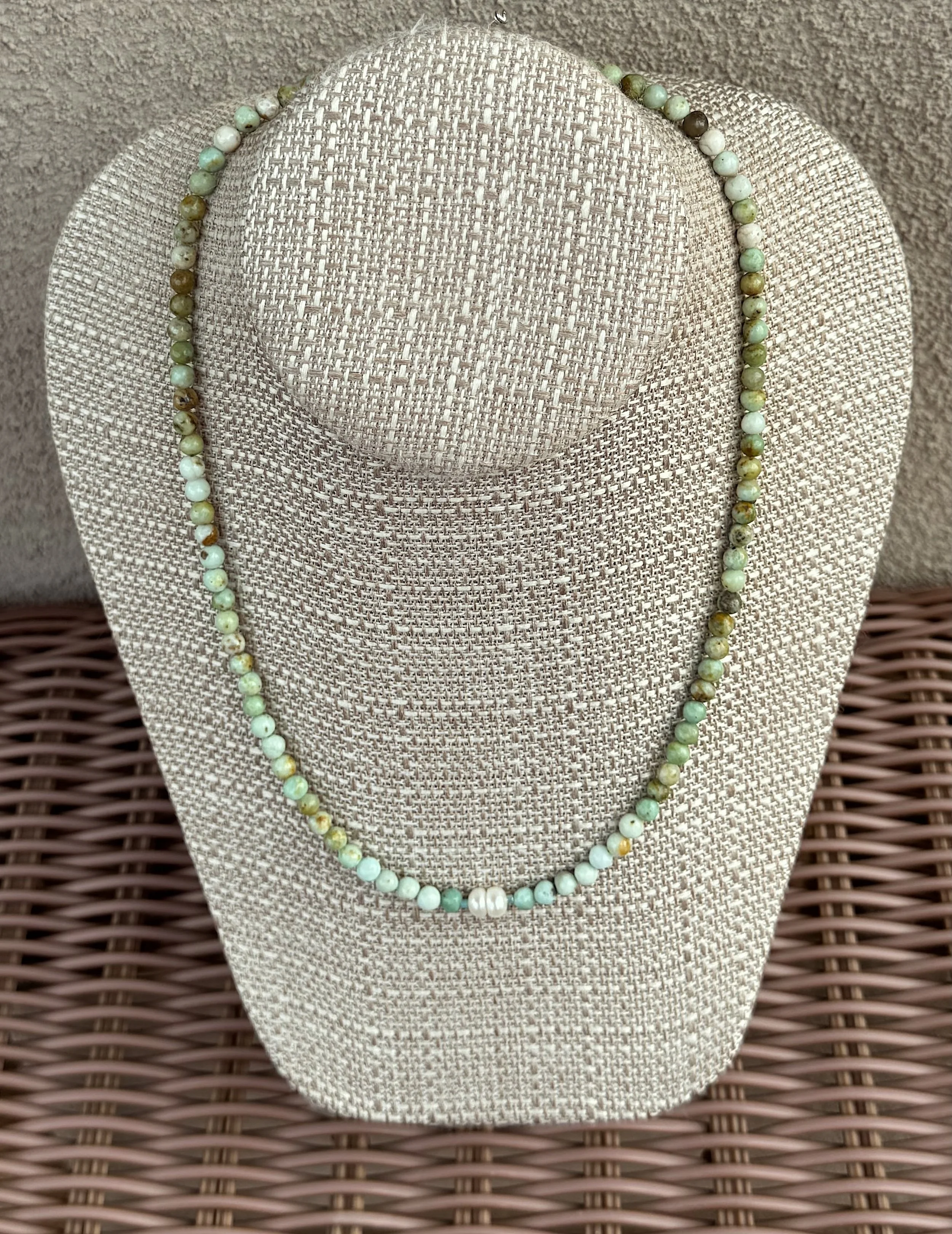 Two Pearls-Maya Jade wicker table.jpeg