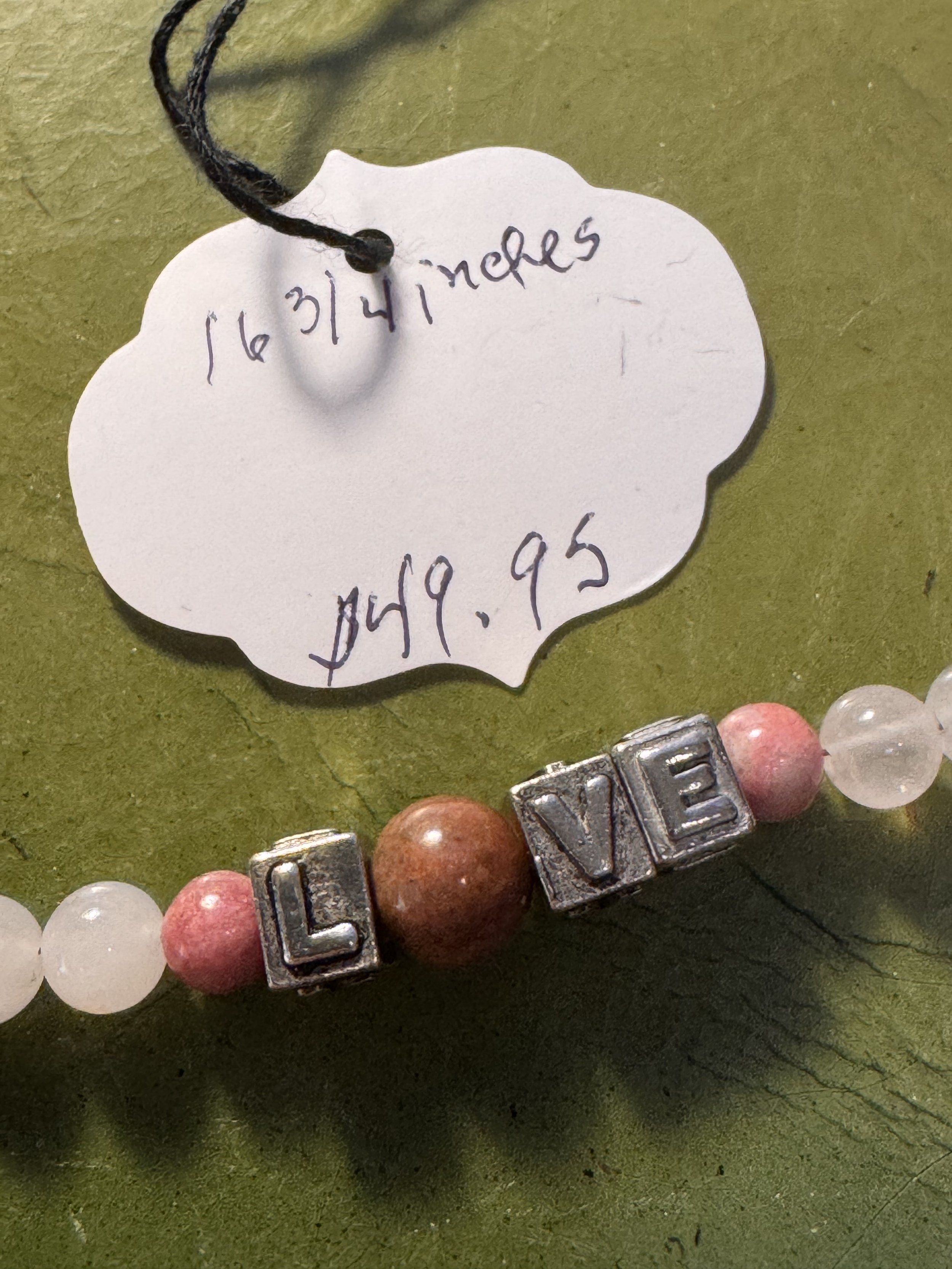 Loveuary necklace tag.jpeg