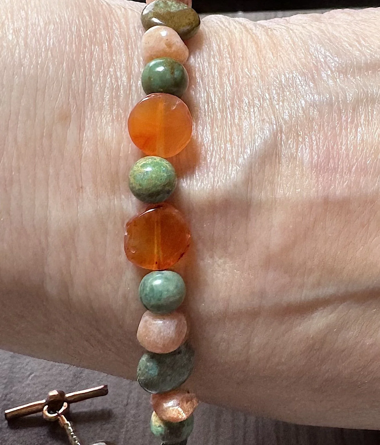 Carnelian Sunstone and Turq. bracelet on me.jpeg