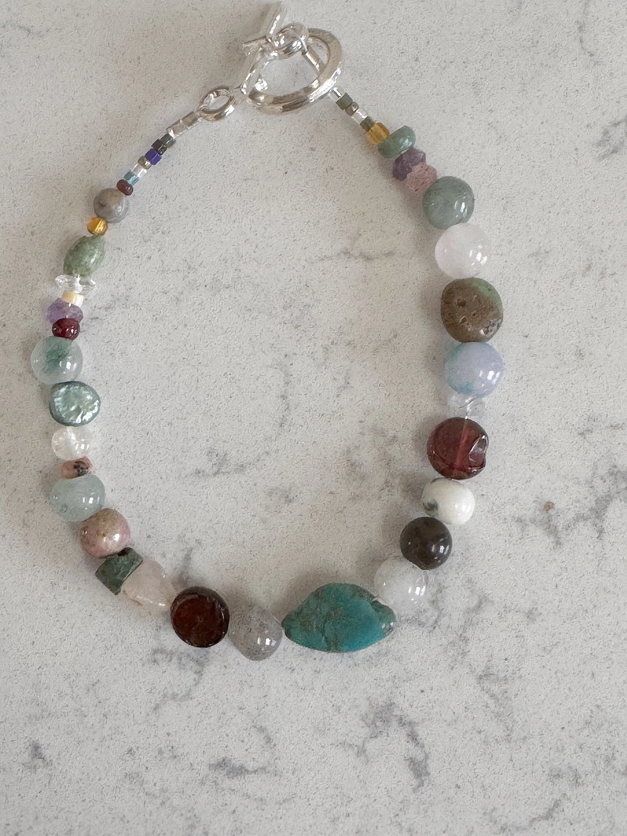 Everything Odds and Ends bracelet Turquoise center.jpeg