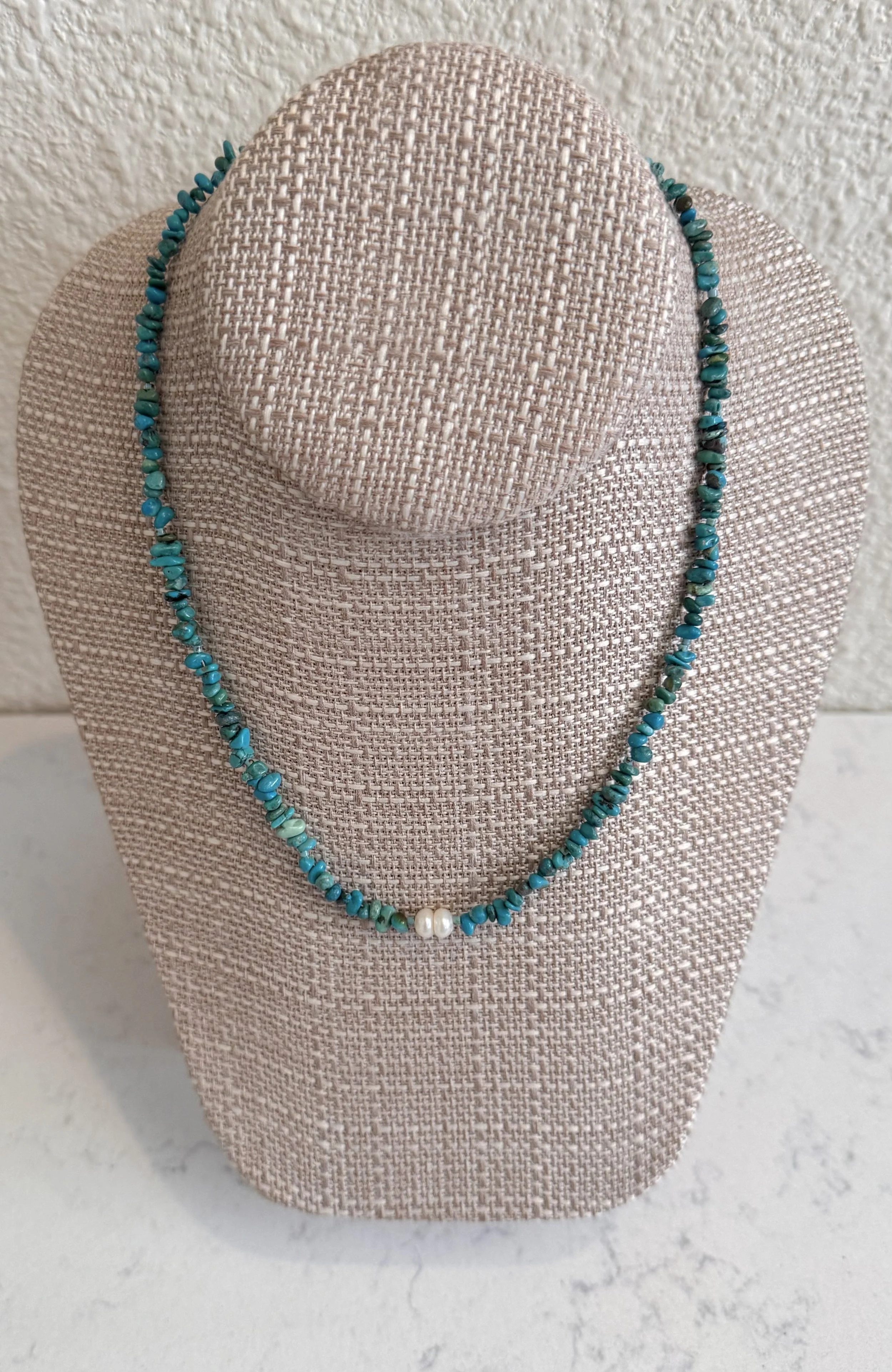 Two Pearls-Turquoise nuggets on stand.jpeg