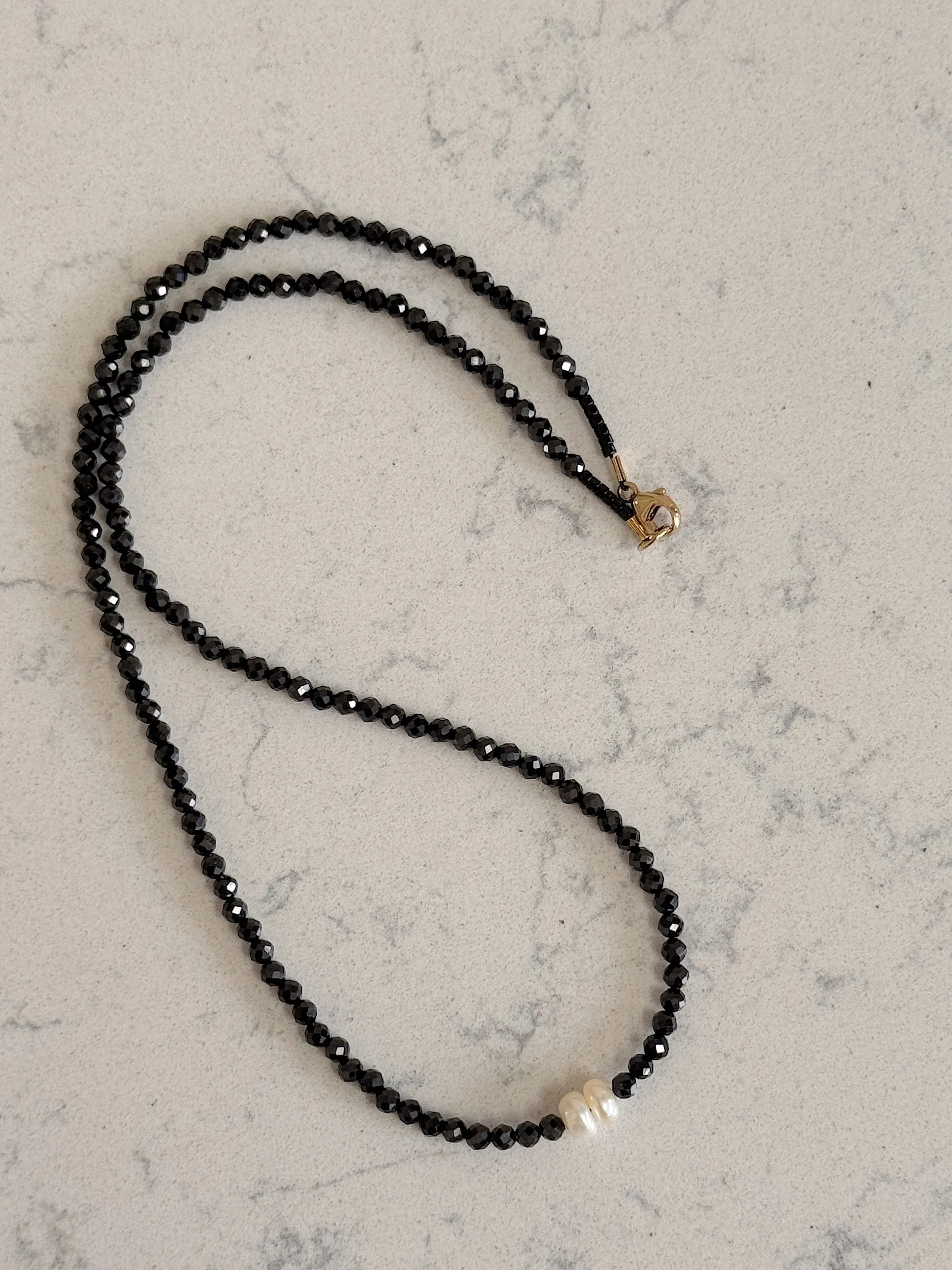 Two Pearls-Faceted Blck Spinel curved.jpeg