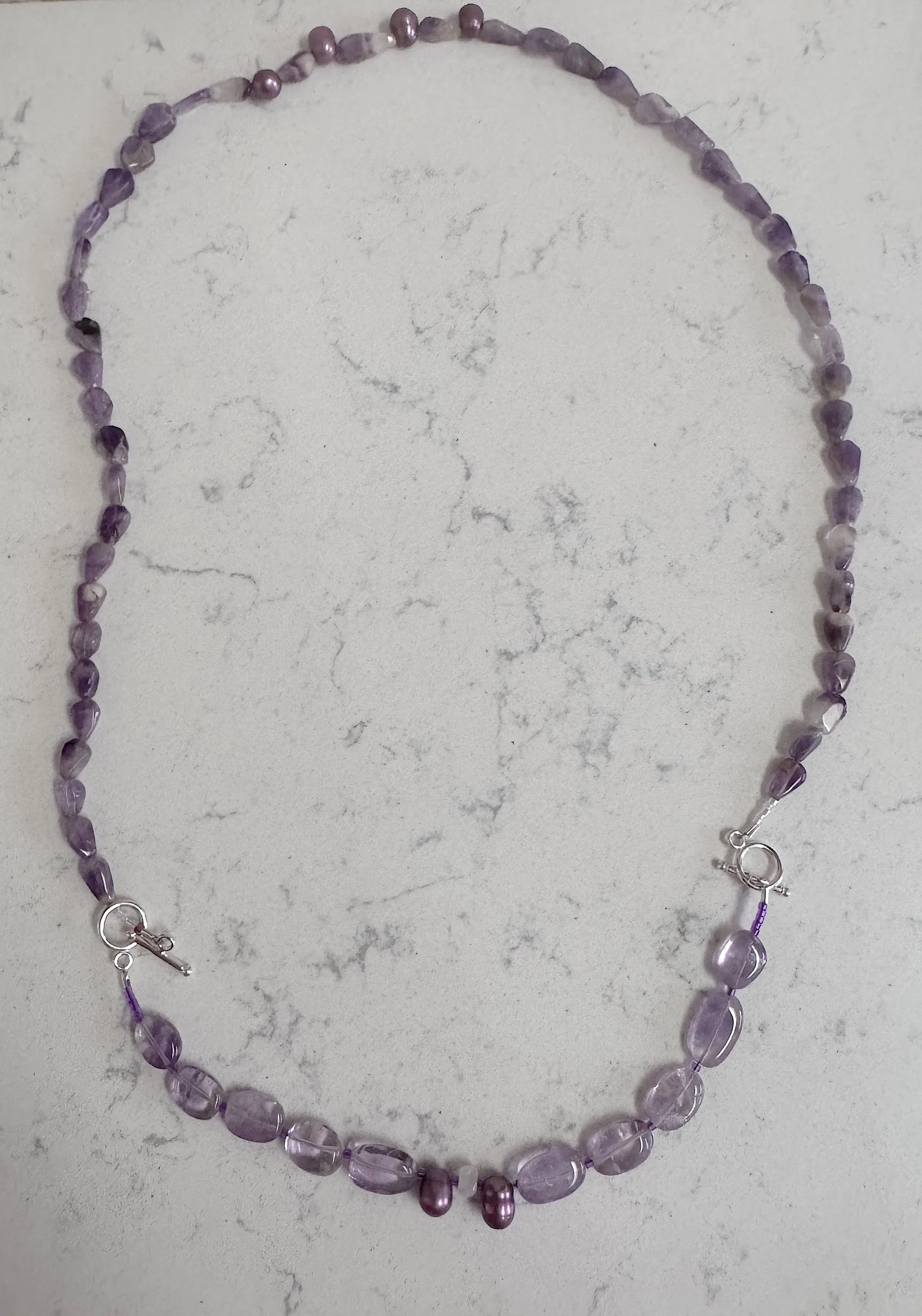 Purple Flowers with bracelet 1.jpeg