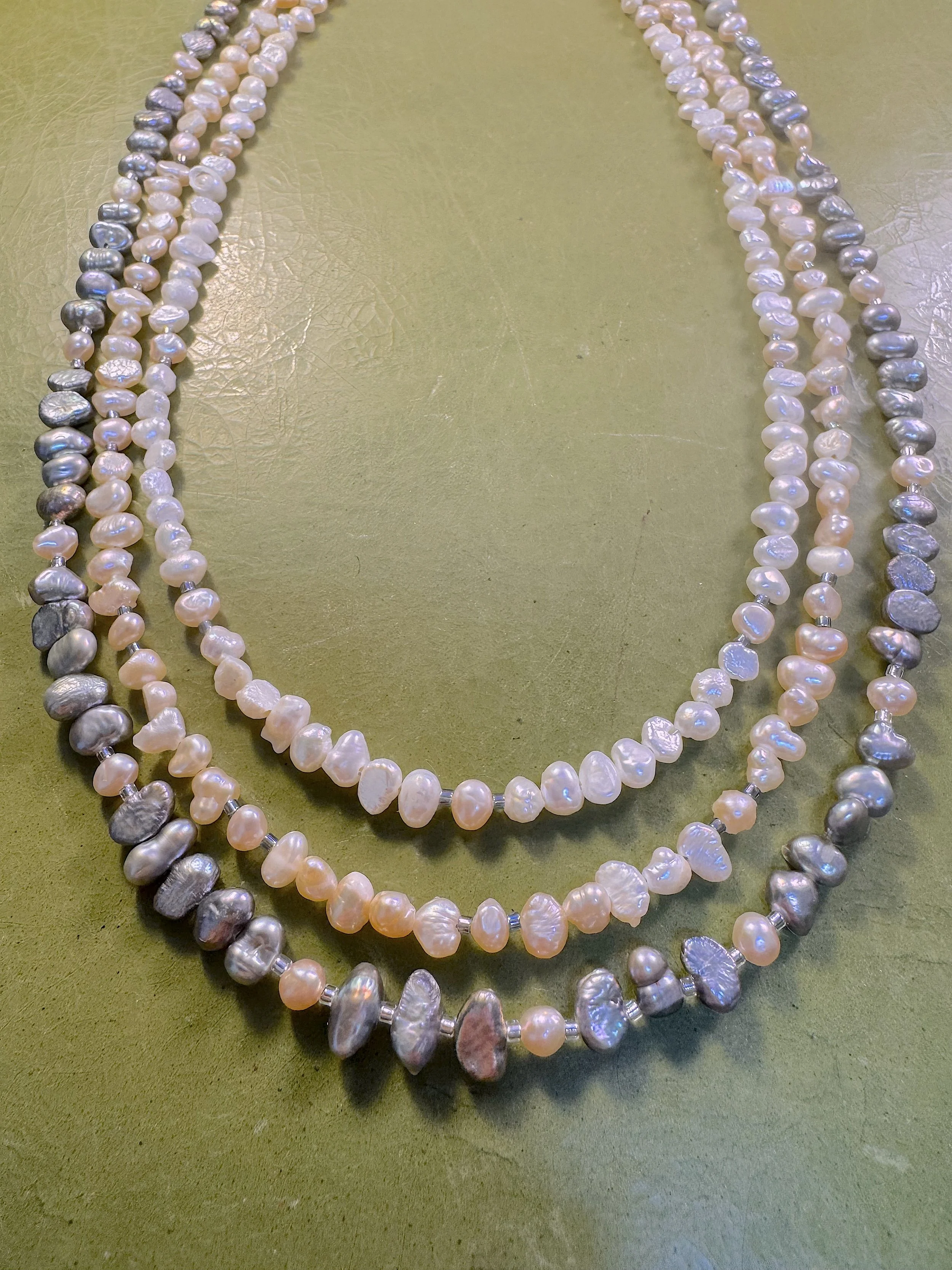 Potato Pearls closeup on green.jpeg