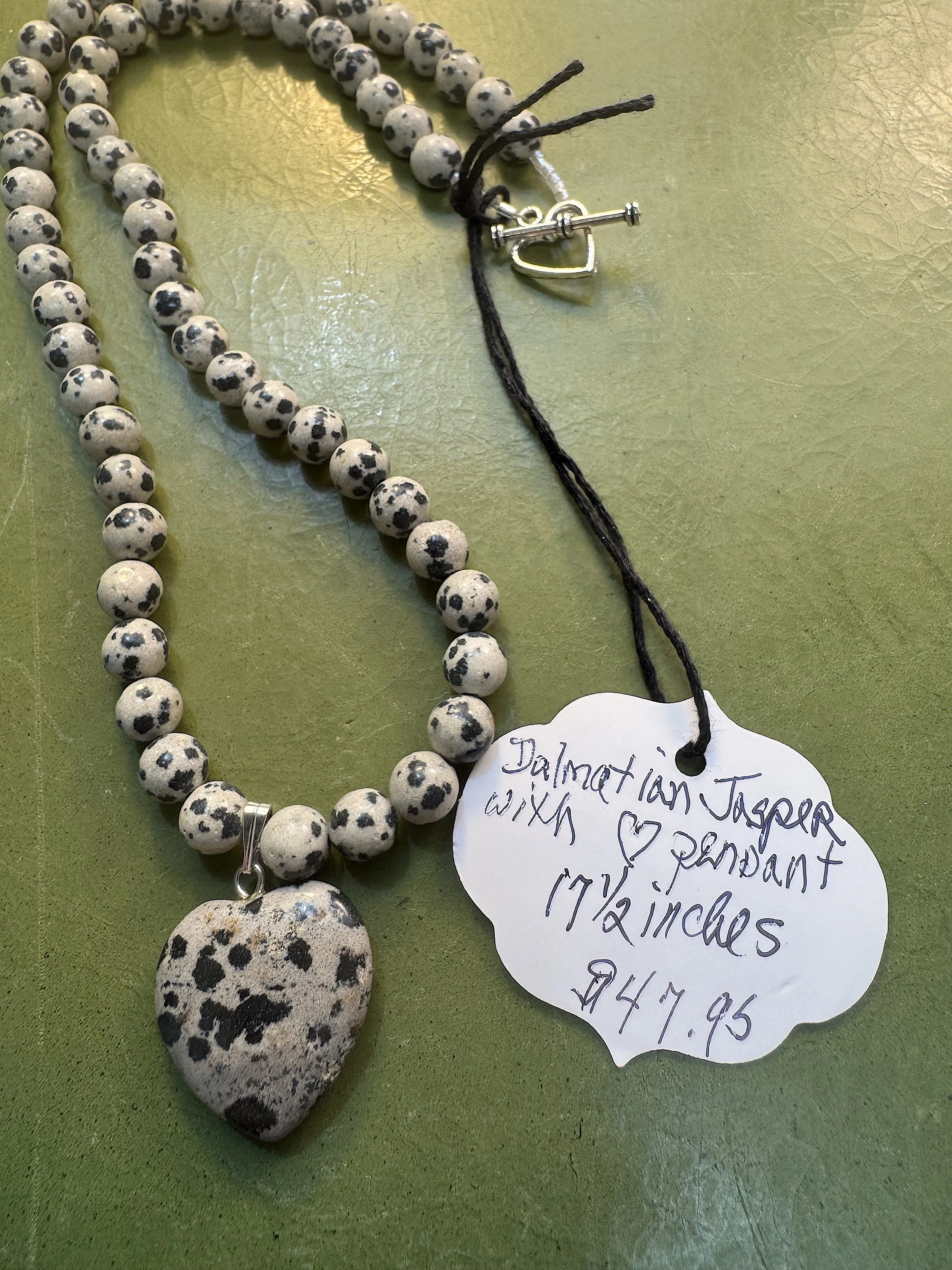 Dalmatian Jasper with heart tag.jpeg