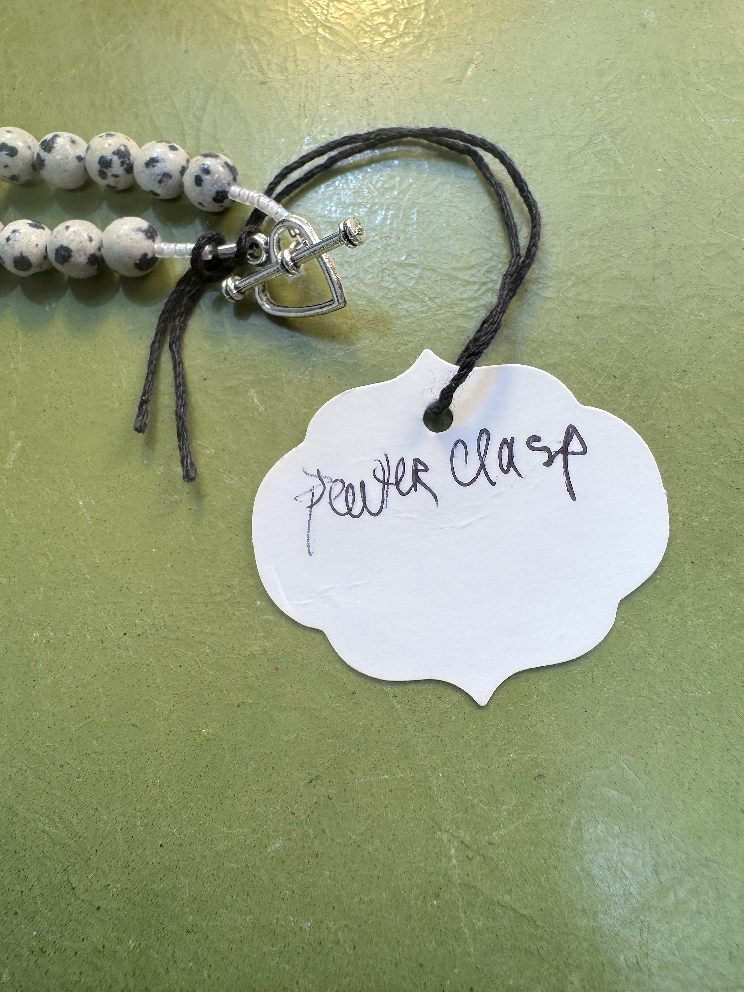Dalmatian Jasper with heart clasp.jpeg