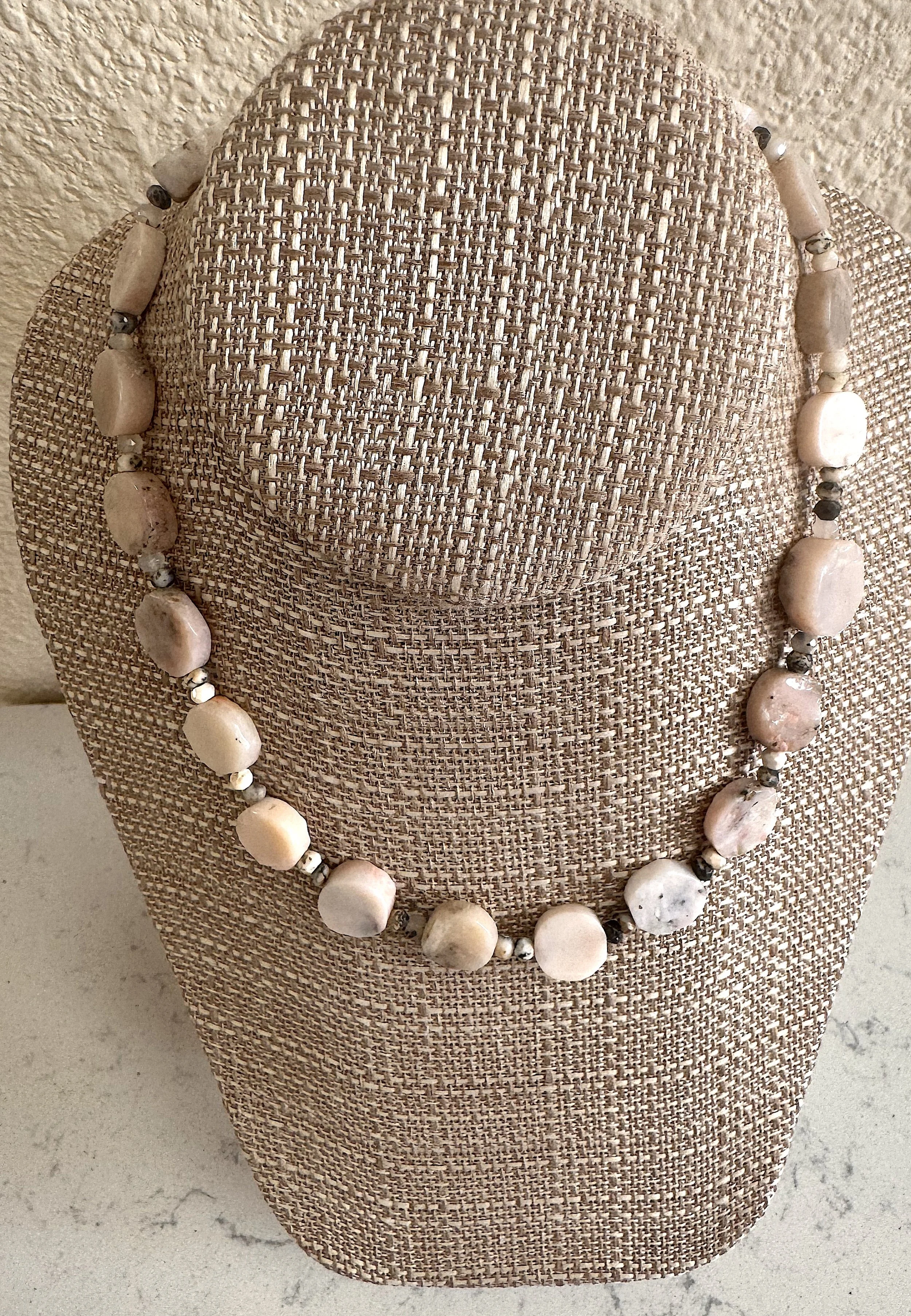 Pink Peruvian Opals on stand.jpeg