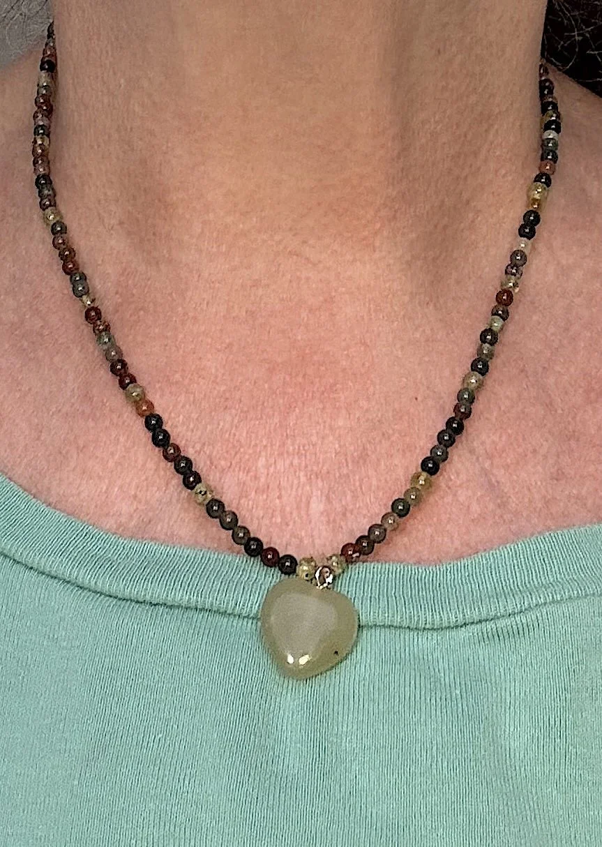 Fancy jasper and Peridot with Green Heart on me.jpeg