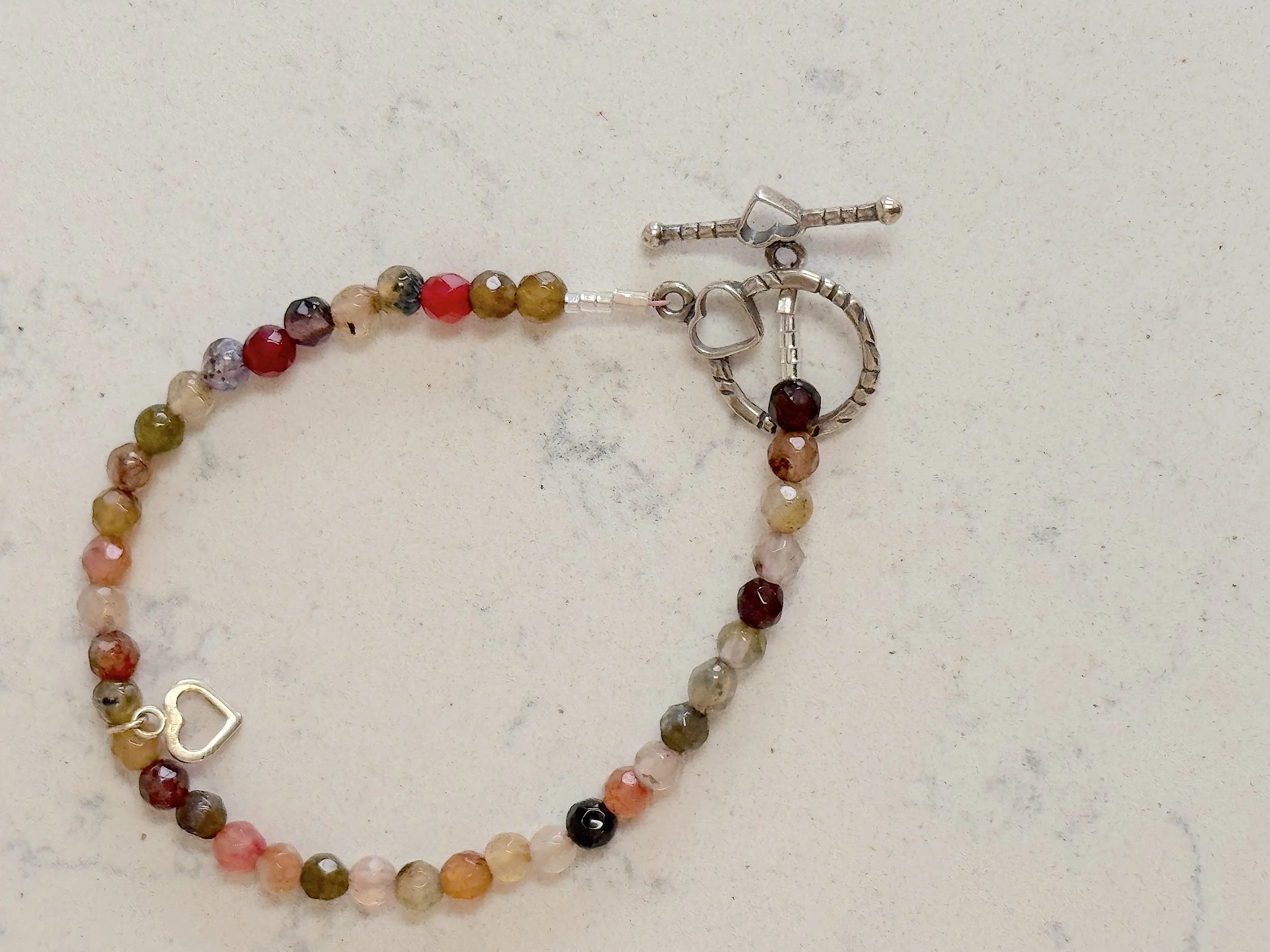 Multi faceted gems with sterling heart bracelet full 35.95.jpeg