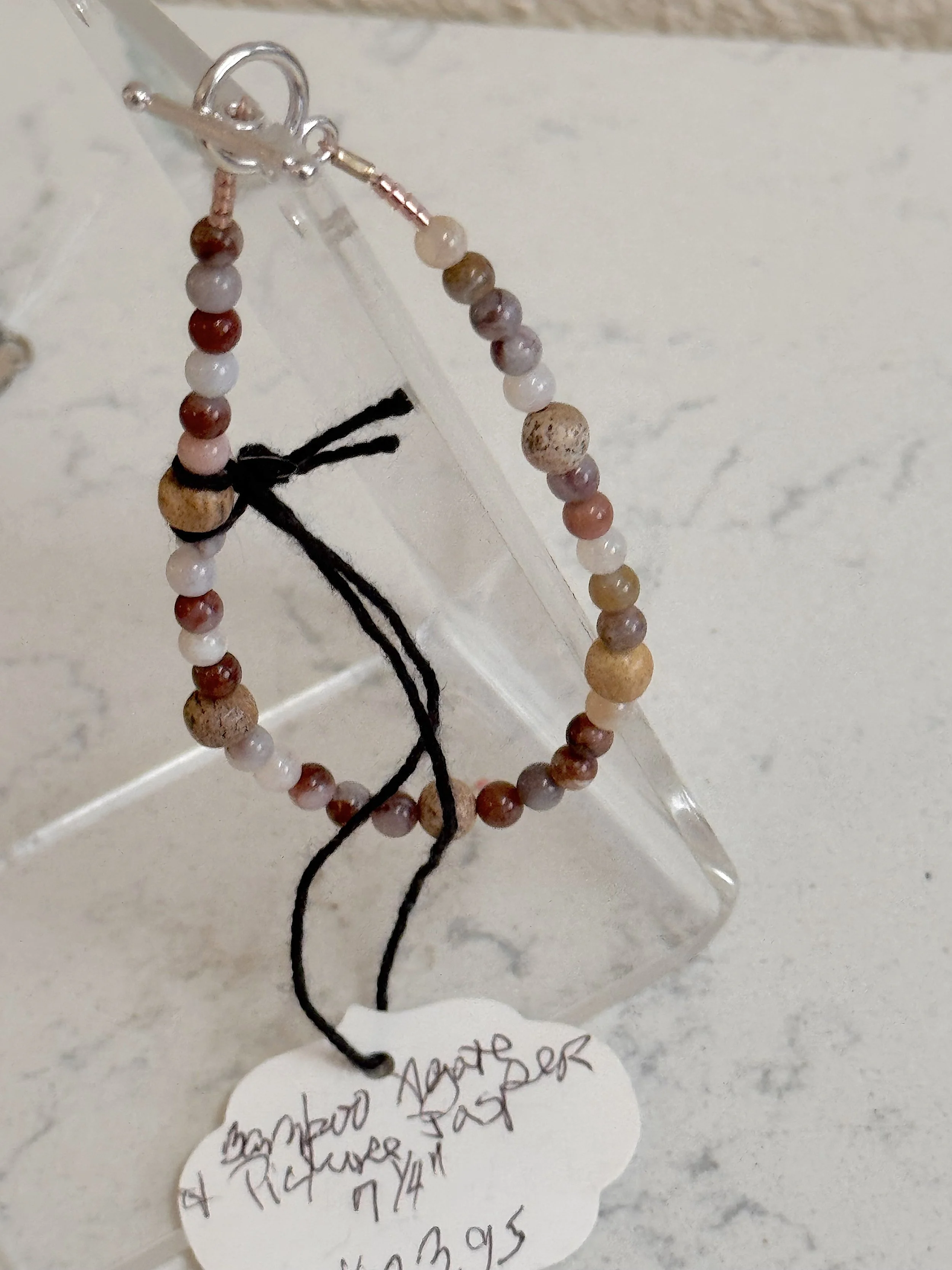 Picture Jasper and Bamboo Agate Brac.on stand.jpeg