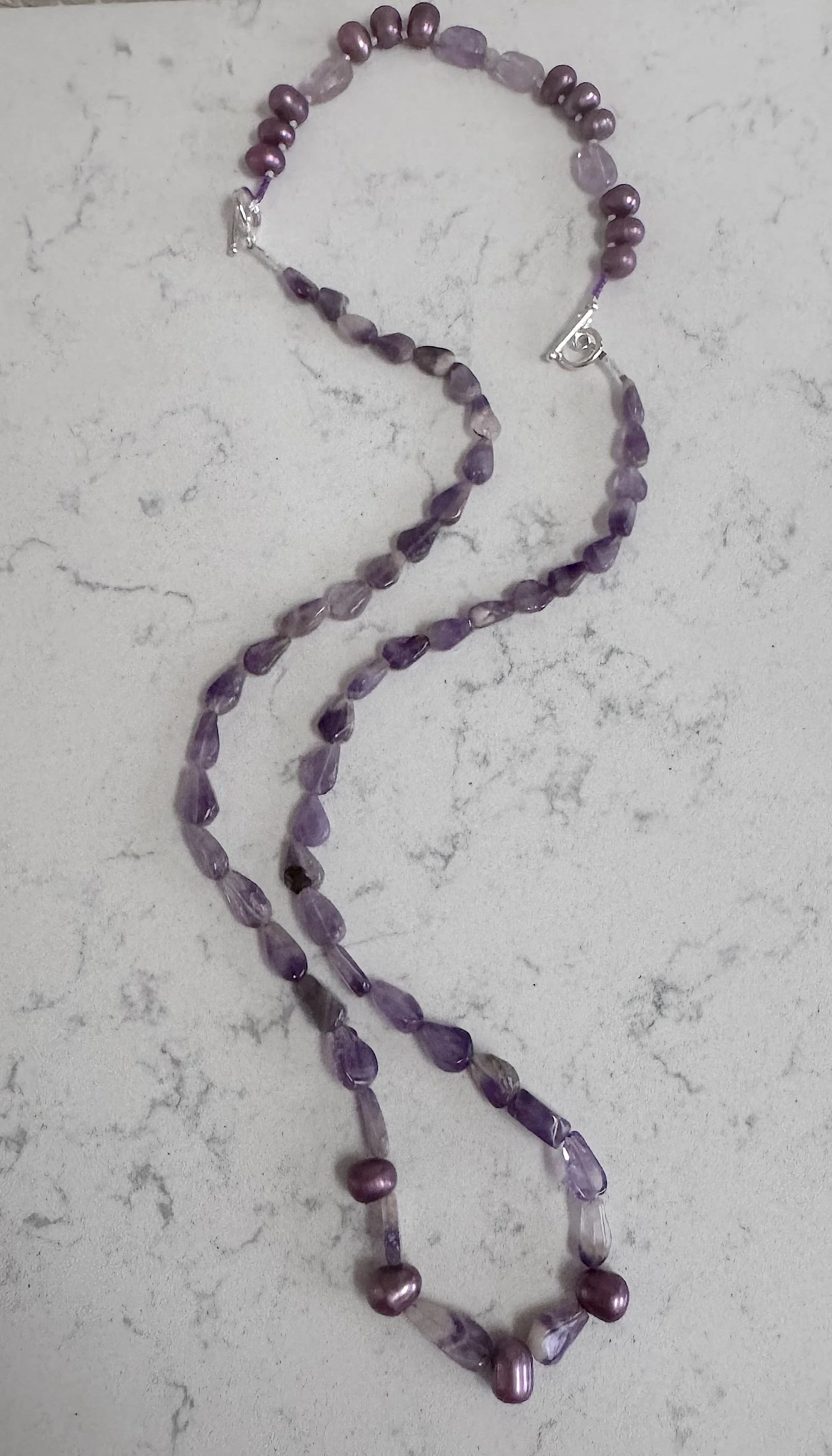 Purple Flowers with bracelet 2.jpeg